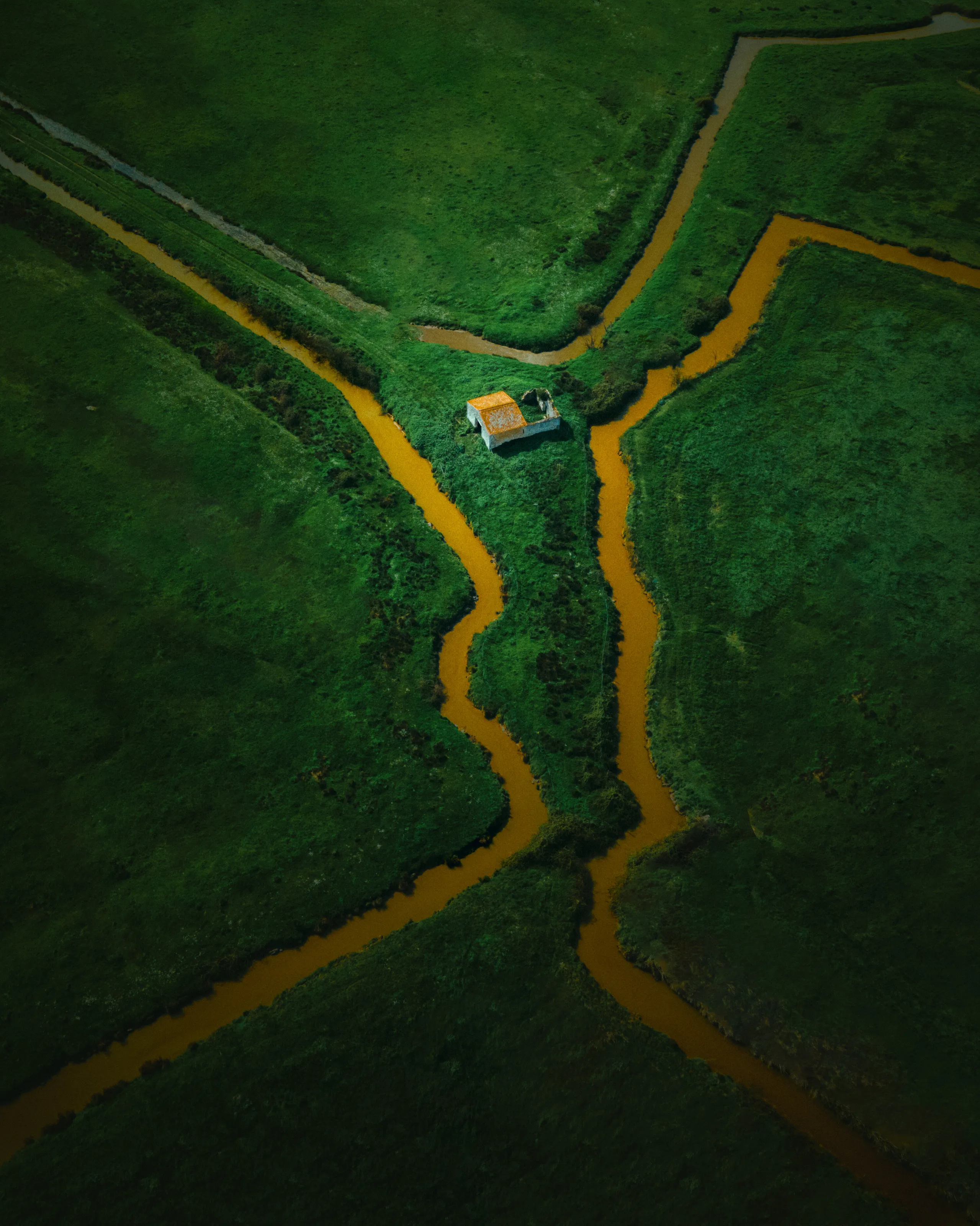 Aerial view of an abandoned house in rural France.