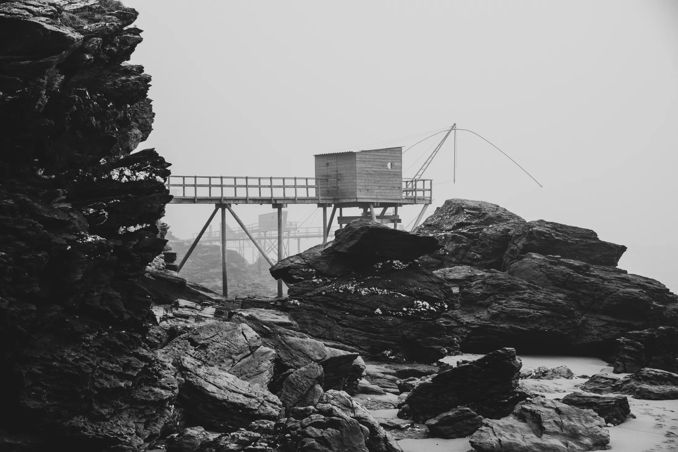 Coastal Fishing Cabin on Rocky Shoreline