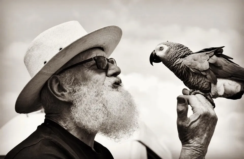 One man, a van & his parrot