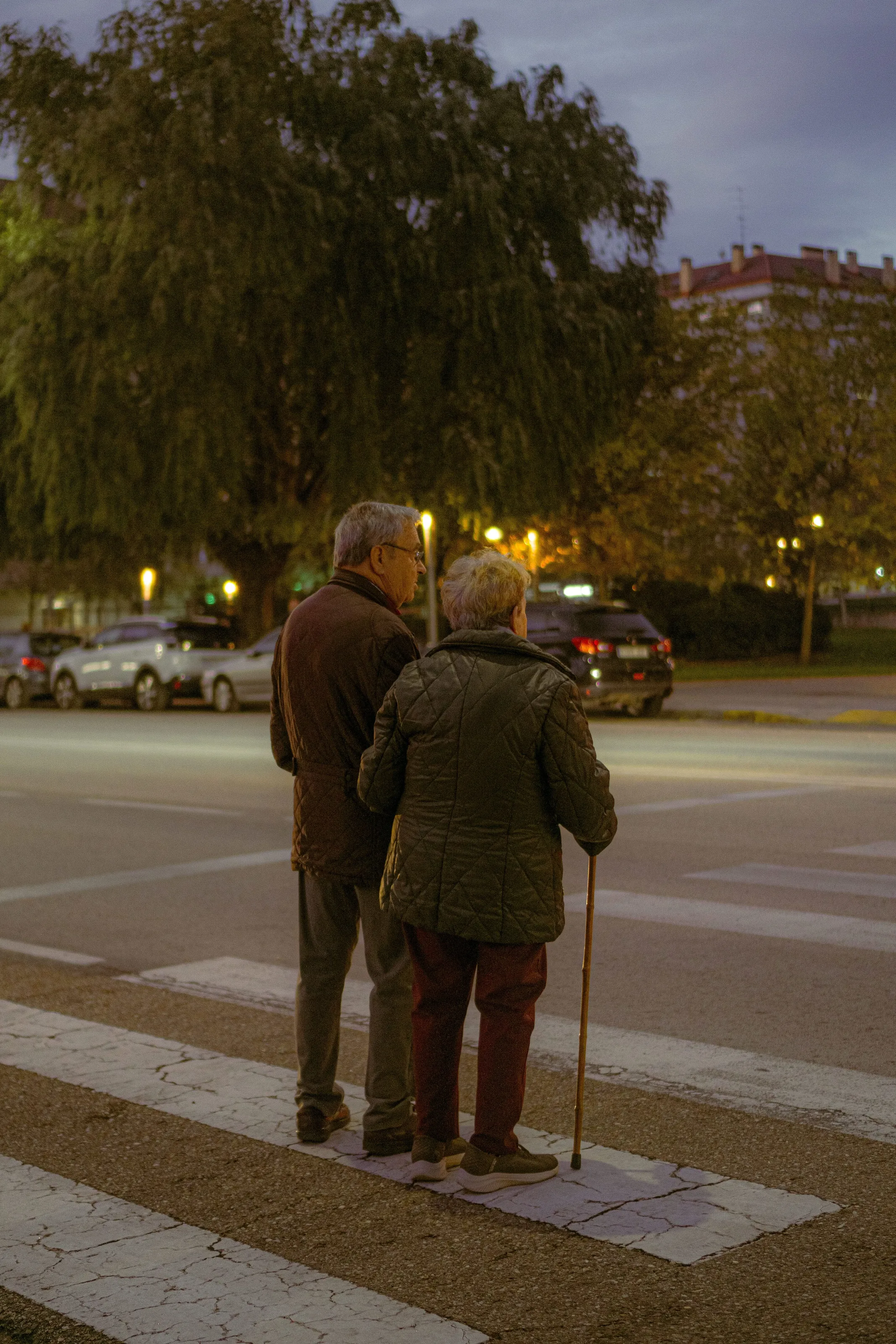 Couple waiting on crosswalk