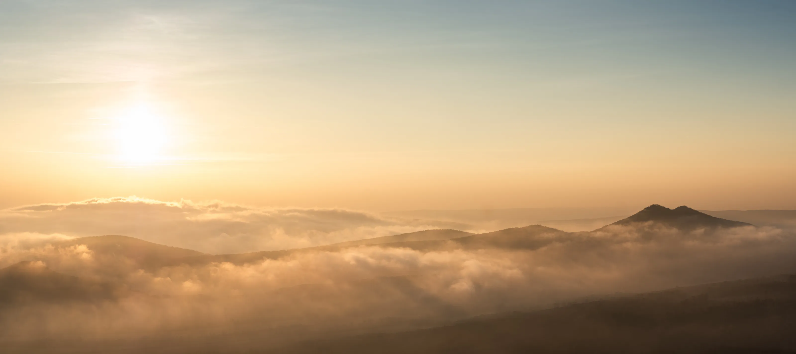 Sunset above the clouds