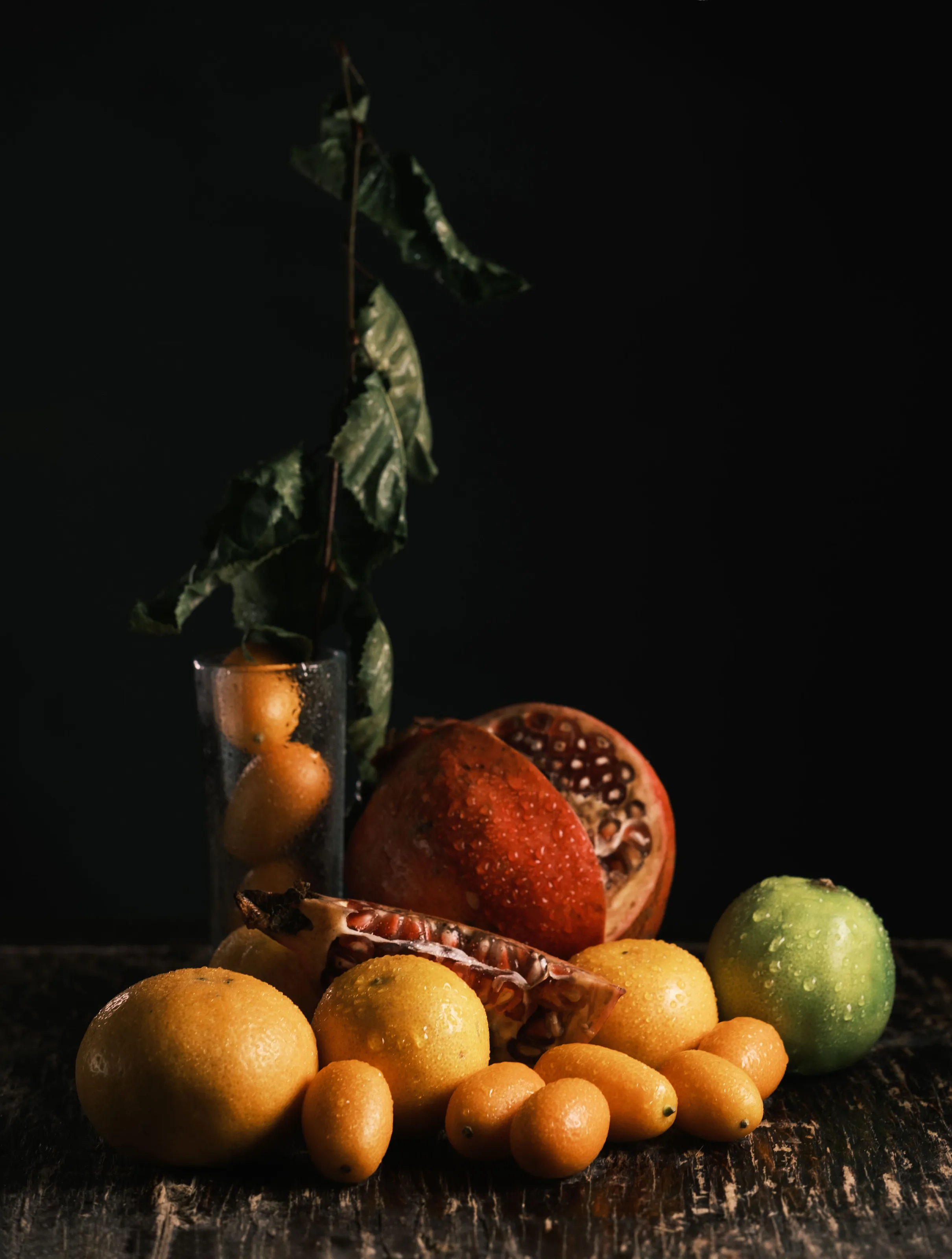 Lime, fortunella, pomegranate, oranges and birch