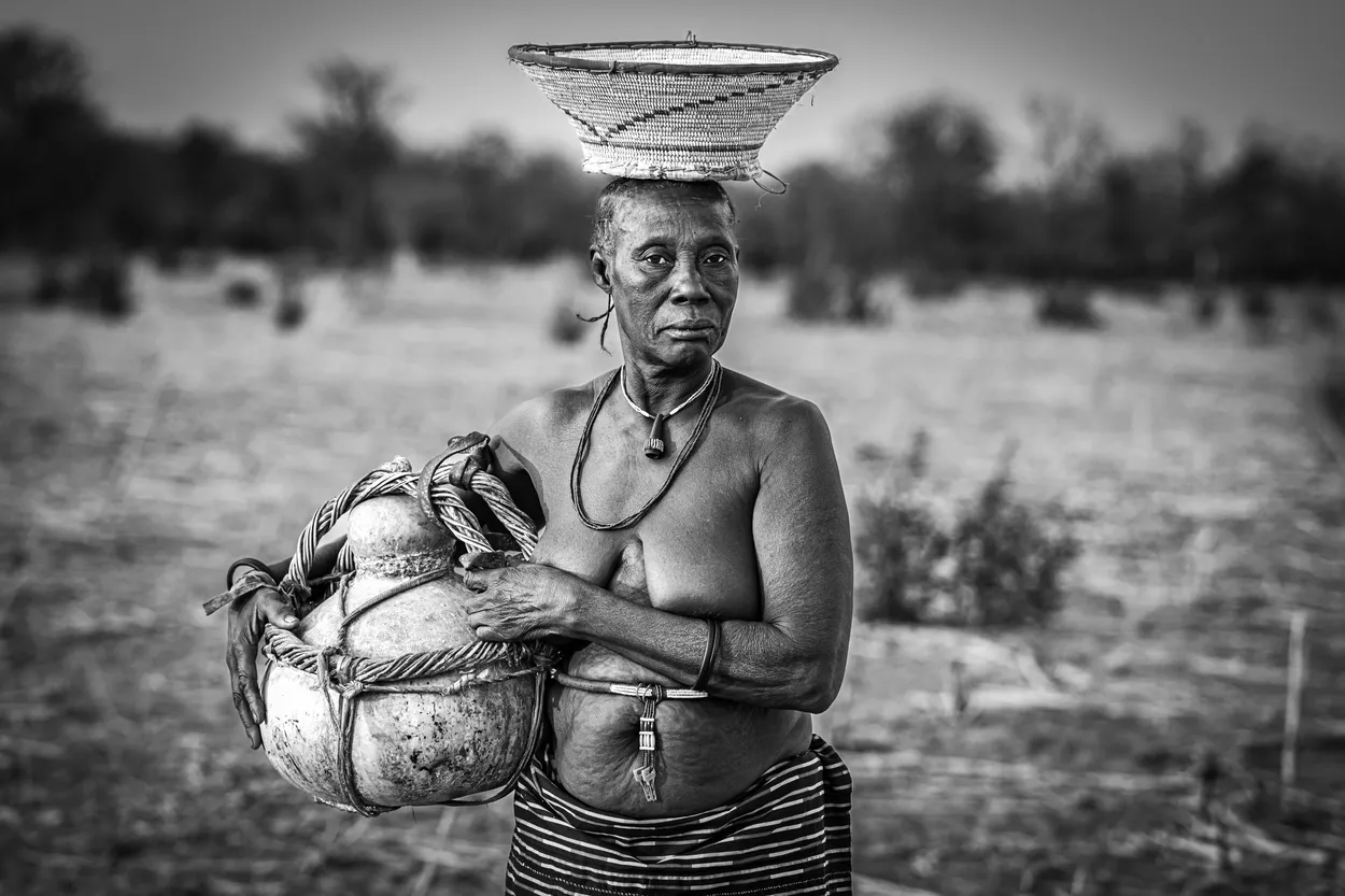 Angolan lady with Goats Milk