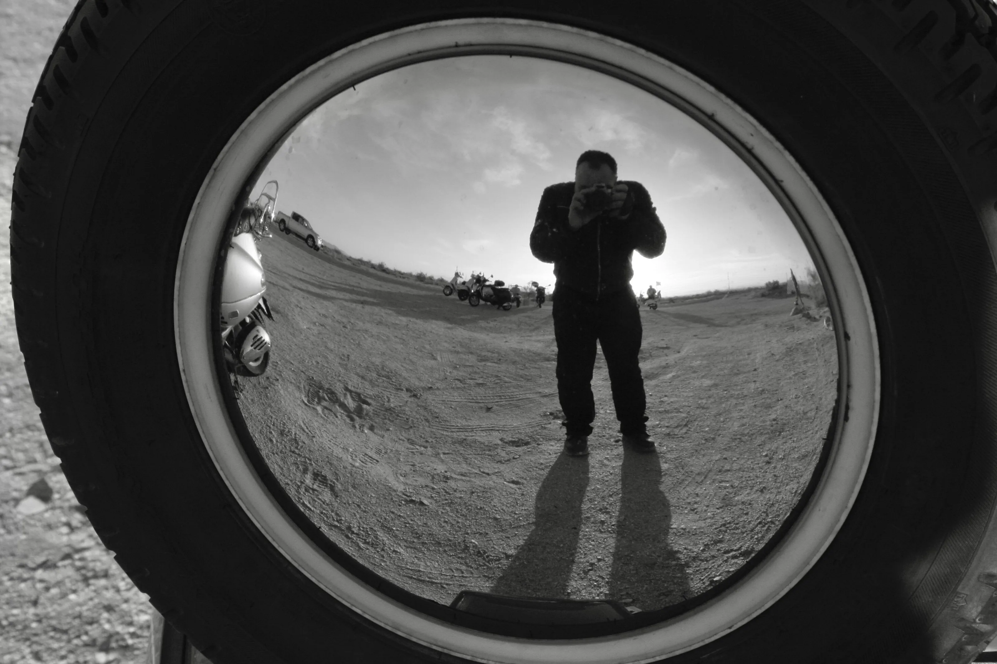 Self portrait in a wheelcover