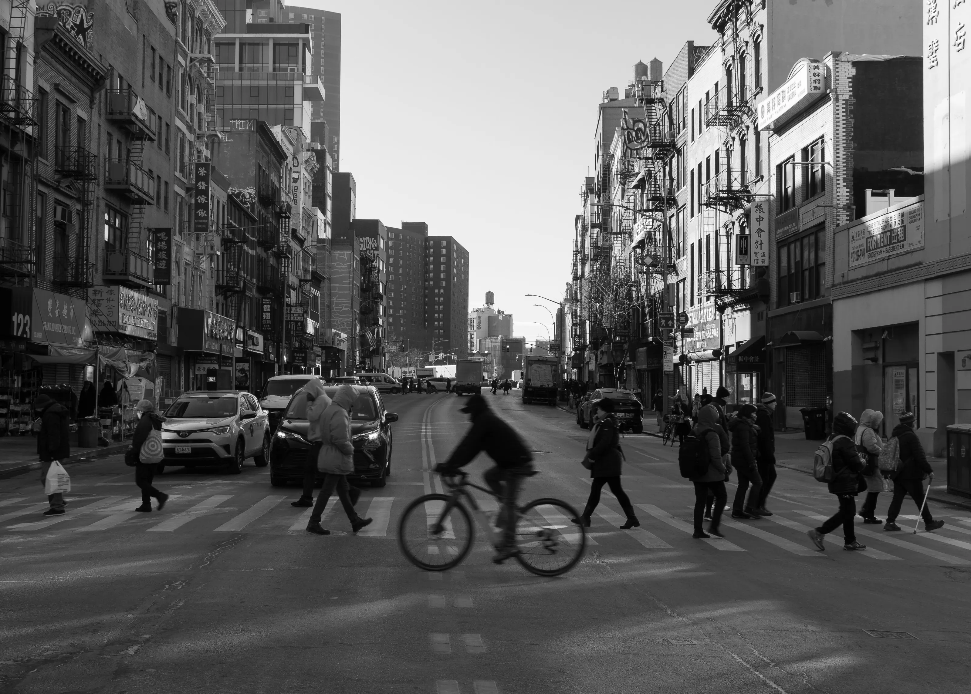 Biker and Pedestrians in Chinatown
