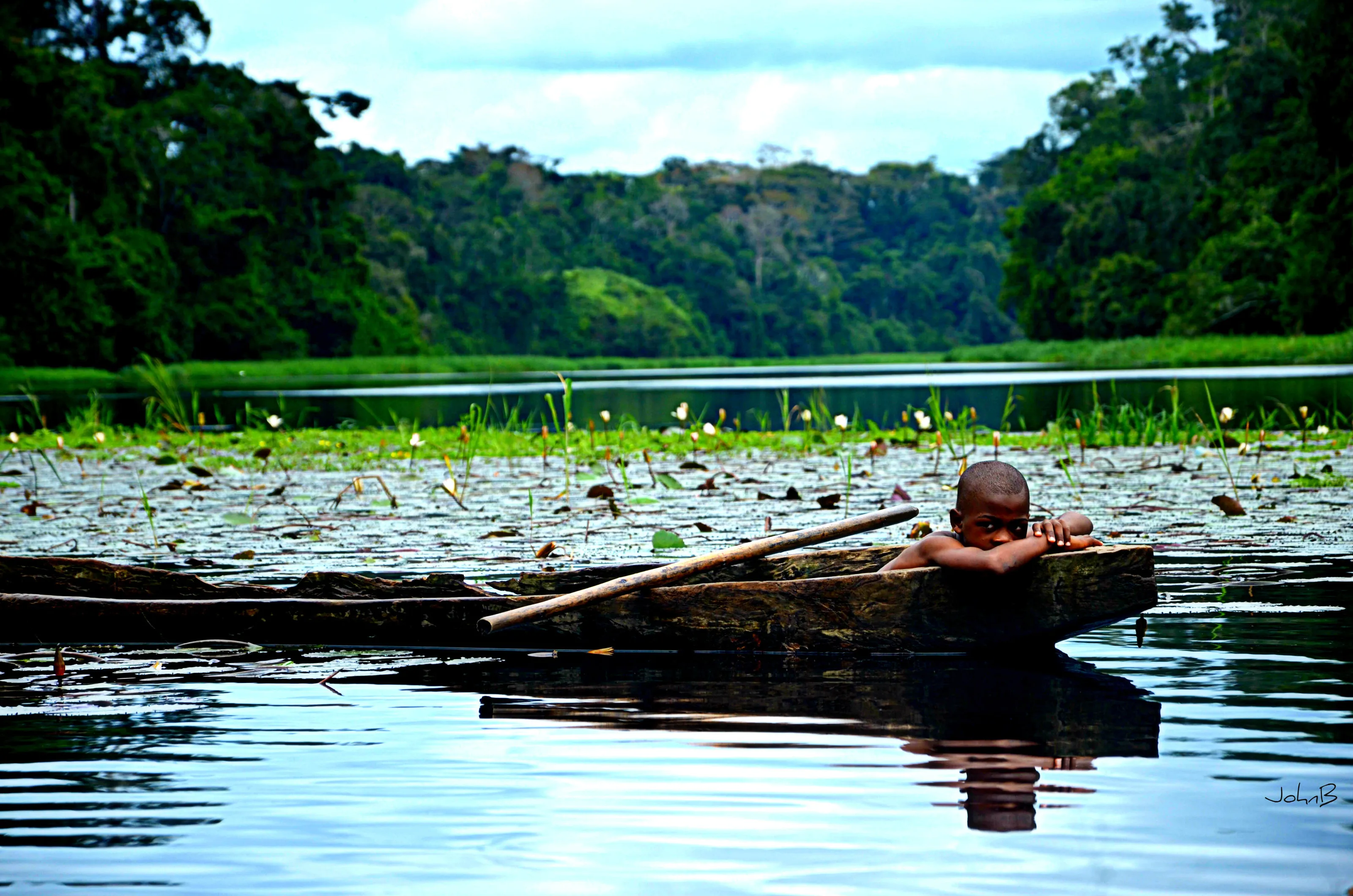 A boy in dugout