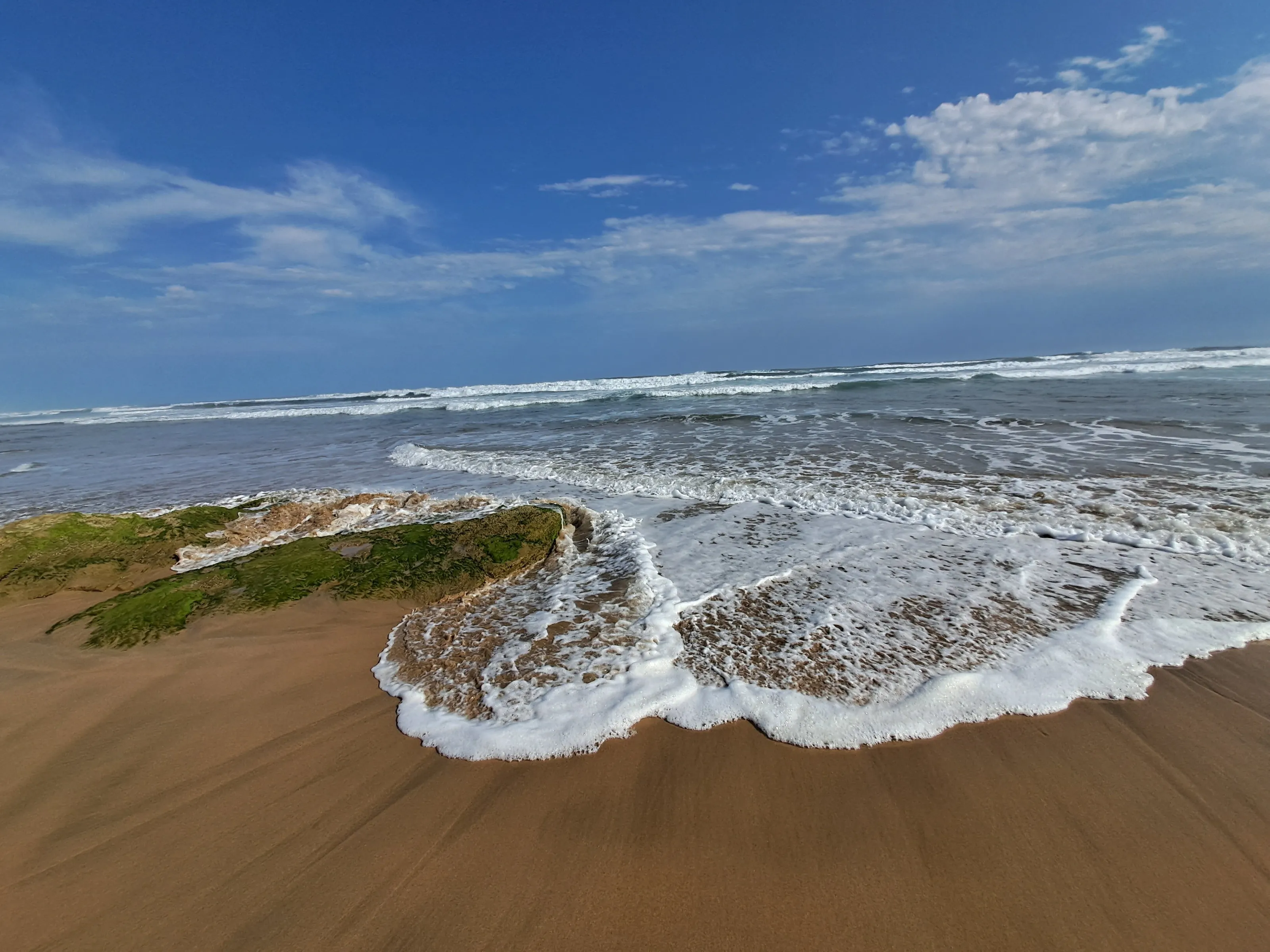 Wave Meets Sand.