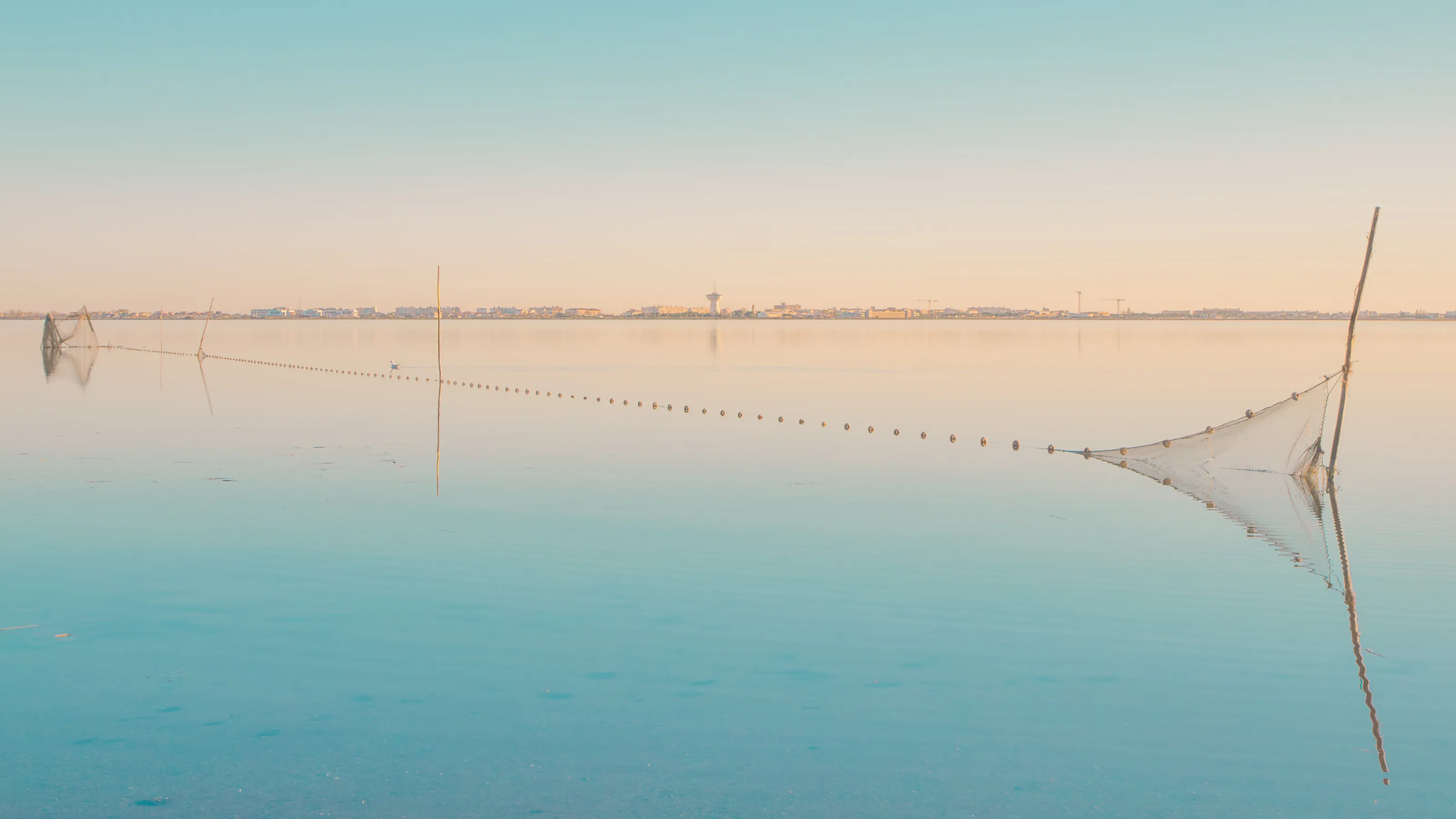 Serene Coastal Fishing Nets at Dawn