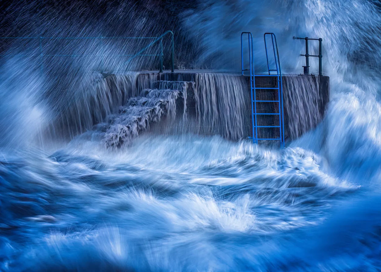 Madeira crashing waves and steps Portugal