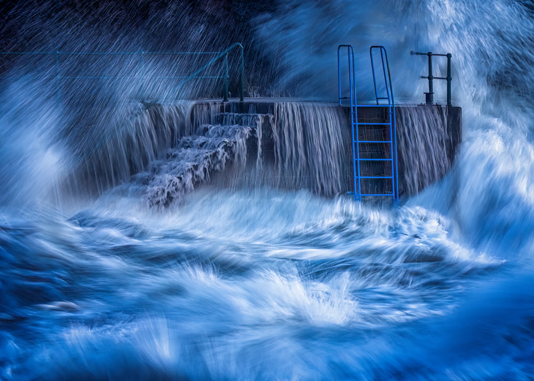 Madeira crashing waves and steps Portugal