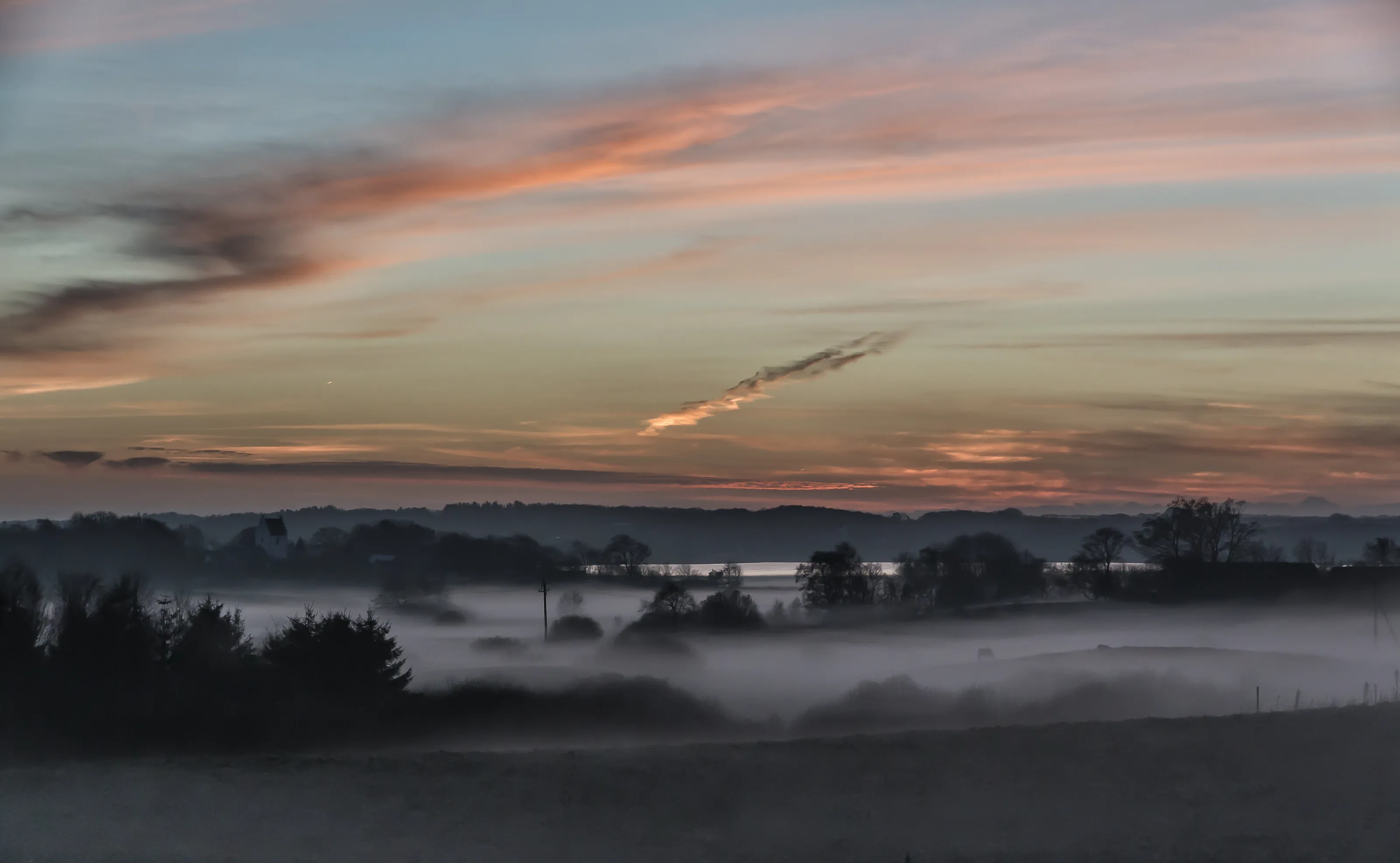 Mist over the meadows at Hvornum, Denmark