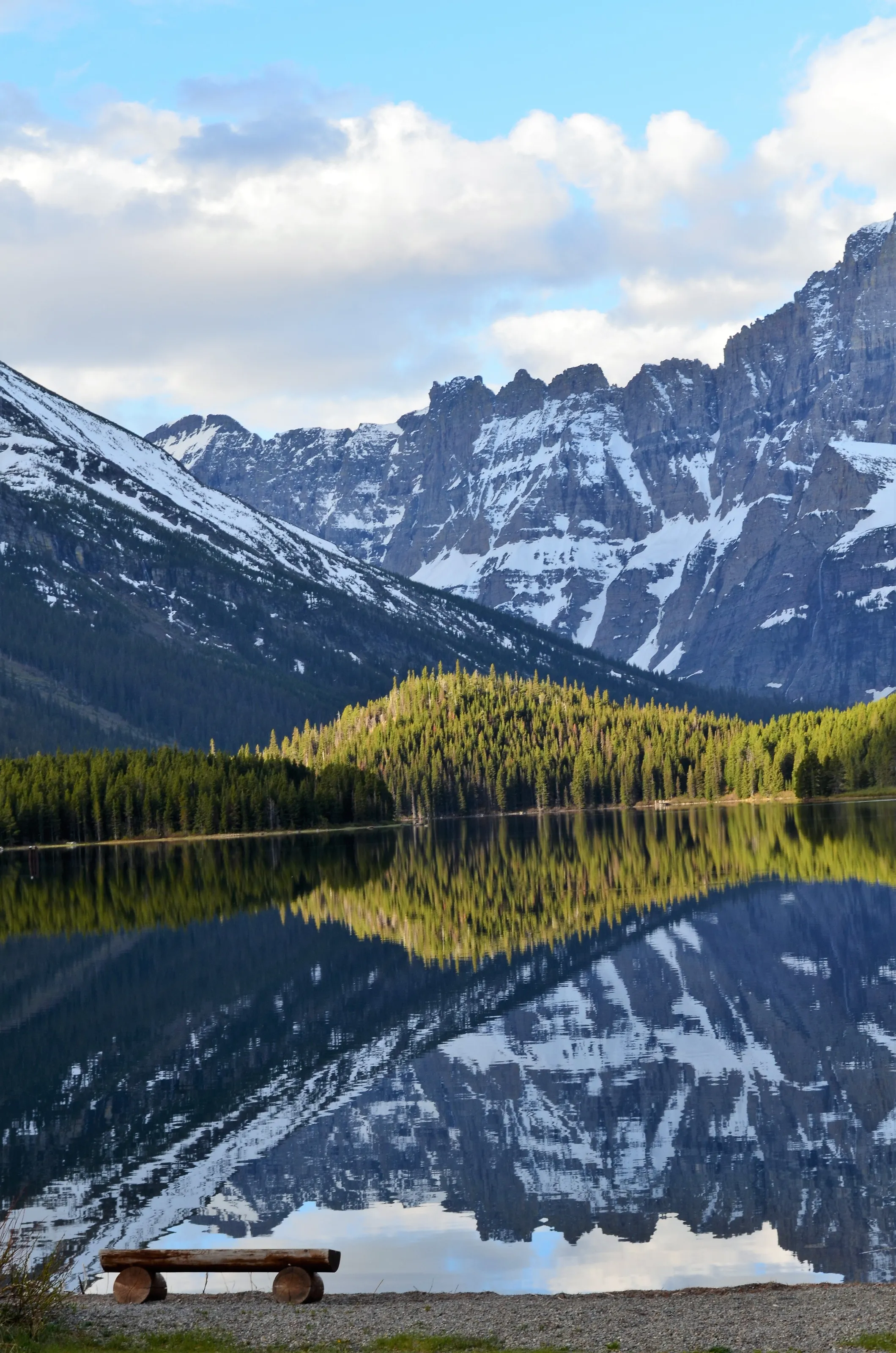 A place to sit while admiring the amazing snow covered mountain reflection off of the water !