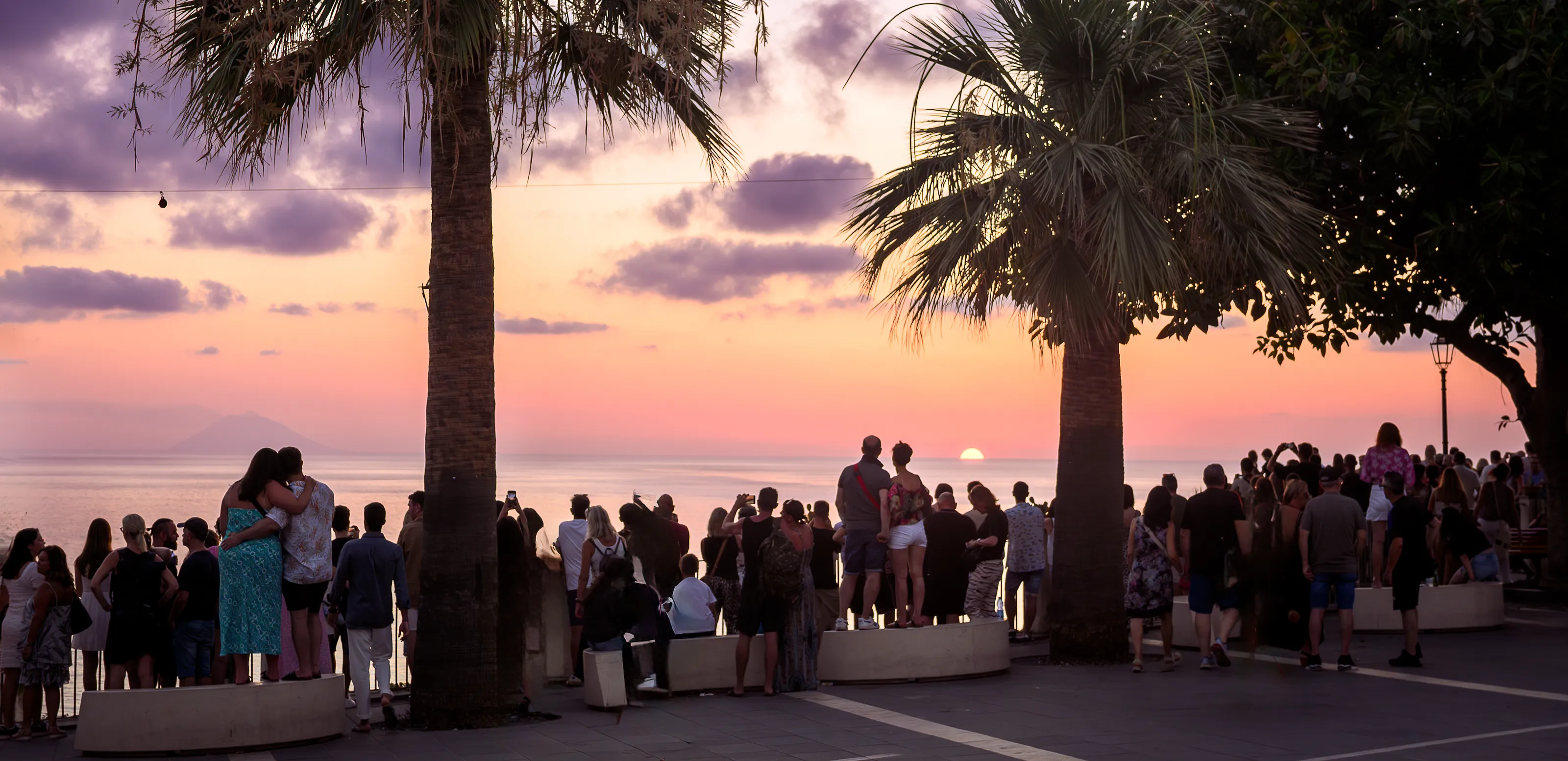 Crowds Watching Sunrise or Sunset (in colour)