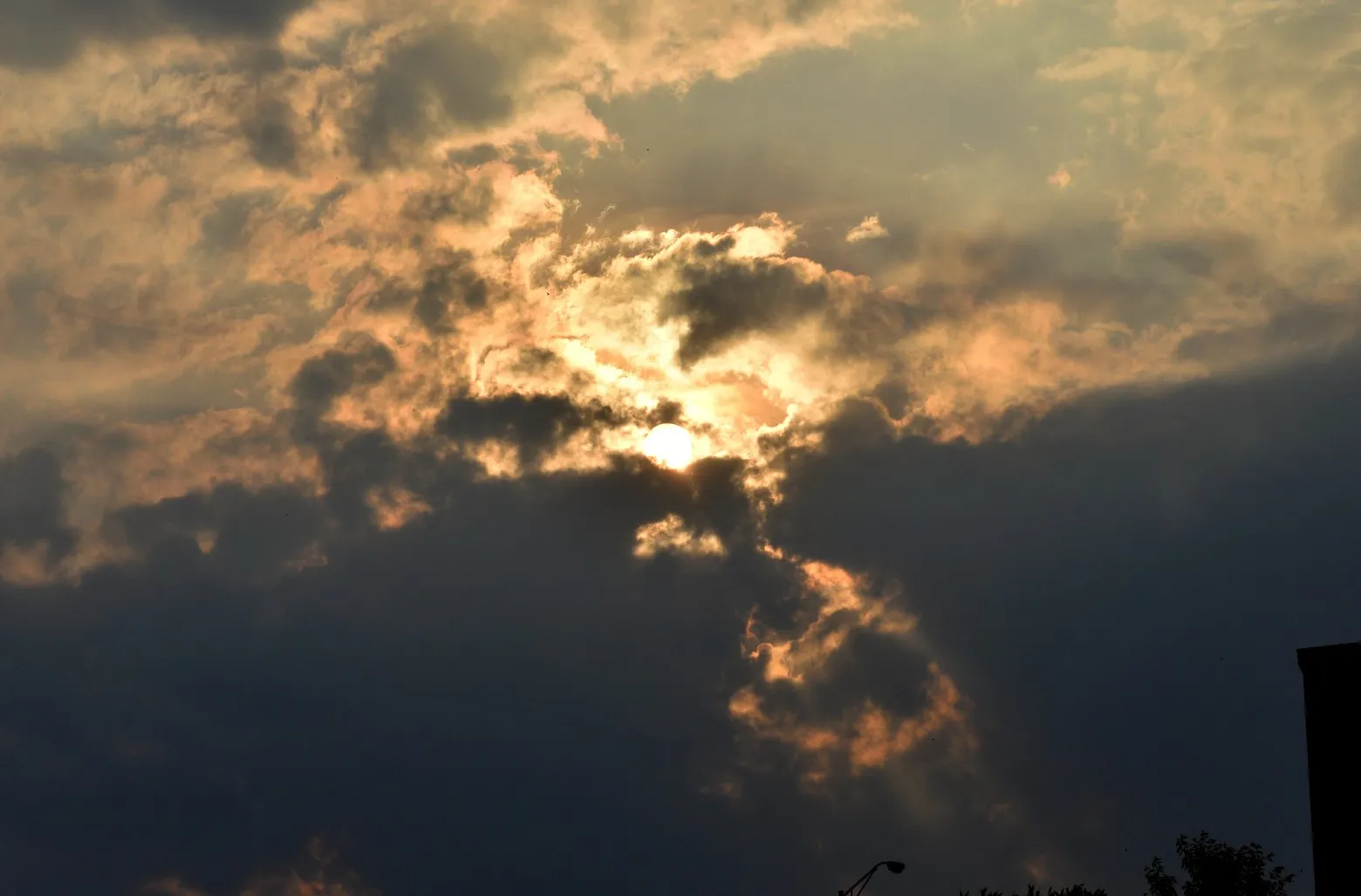 The Sun Partly Covered by Clouds