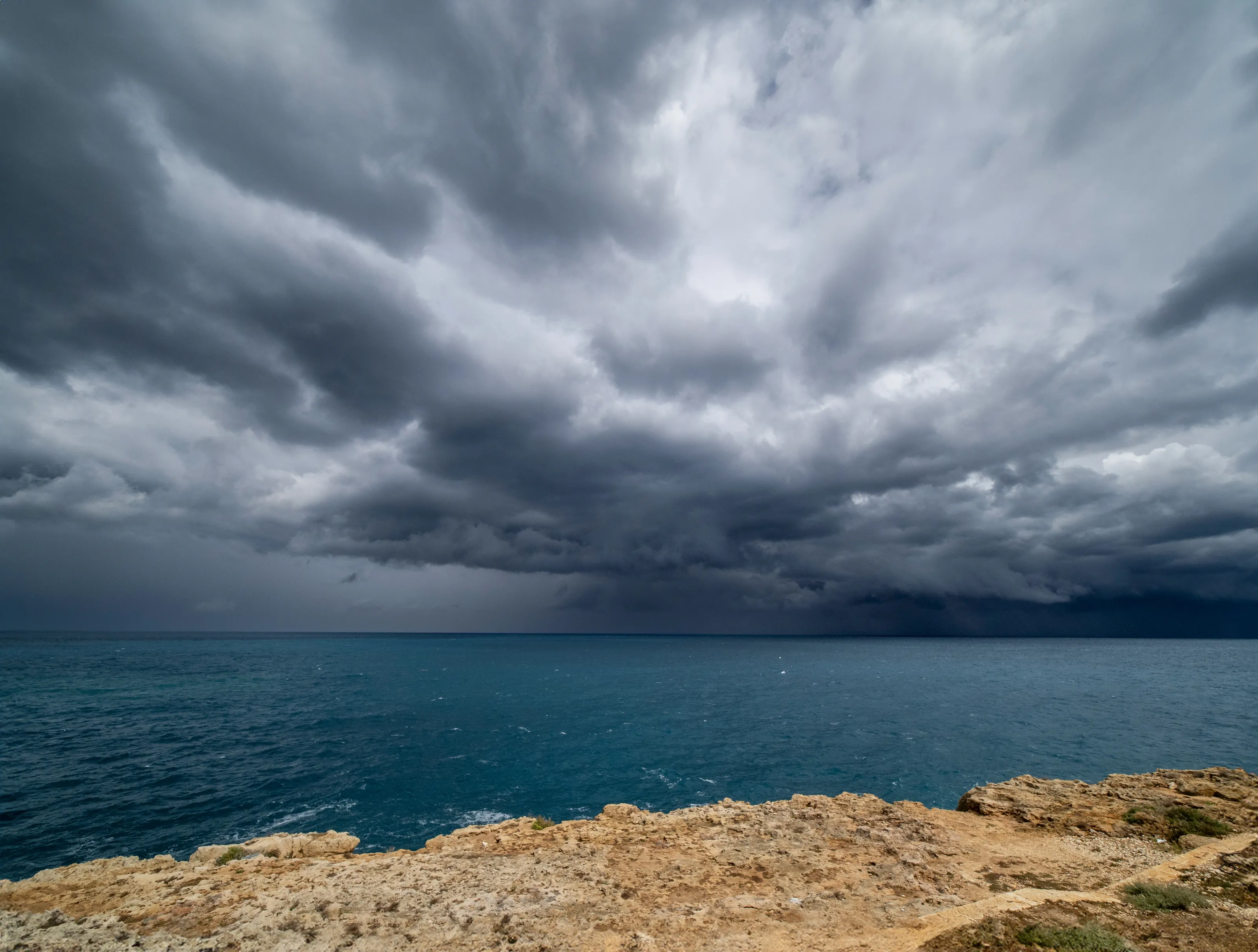 Storm Clouds Over Water