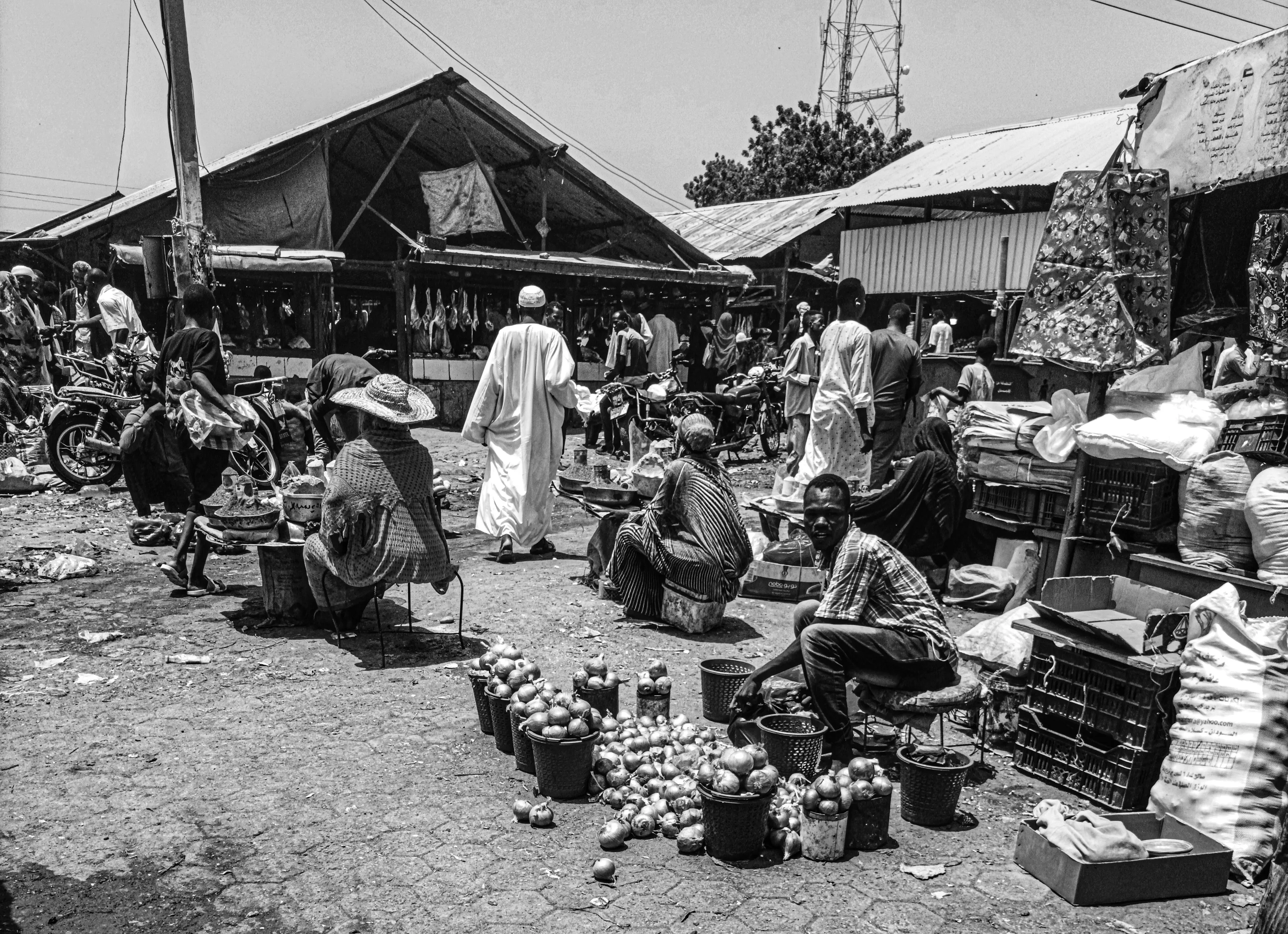 People Selling Things in Black and White