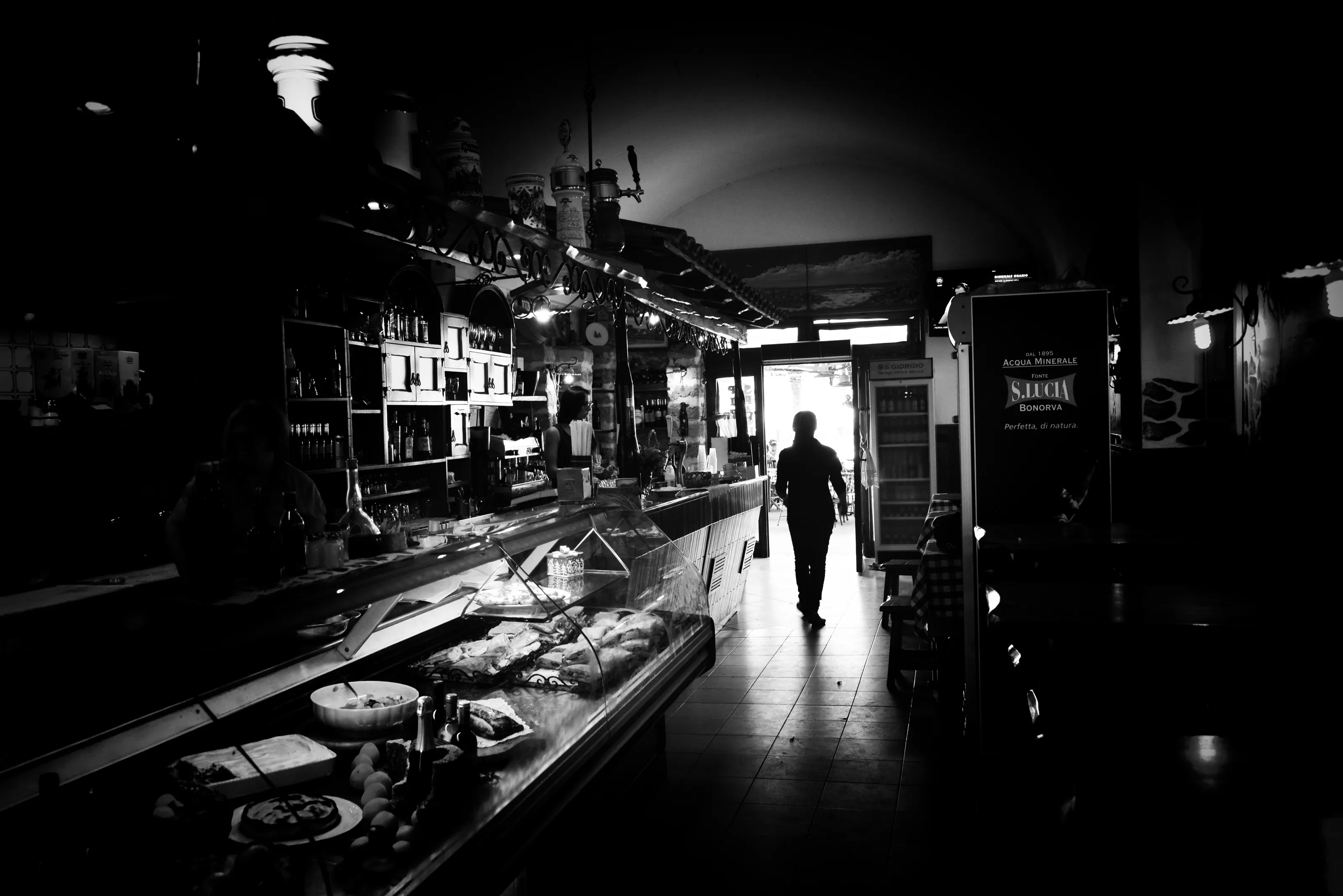 Interior silhouette figure in black and white
