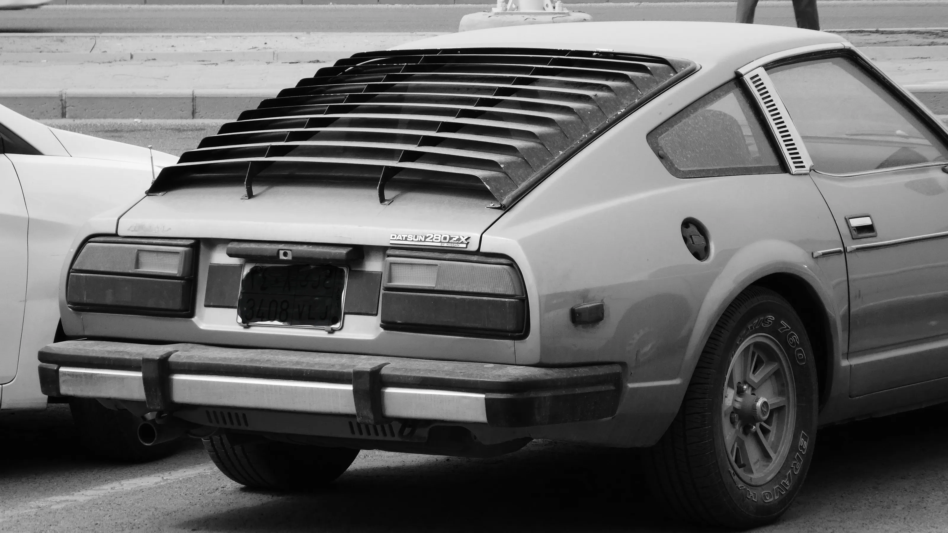 Back end of cars (black & white)