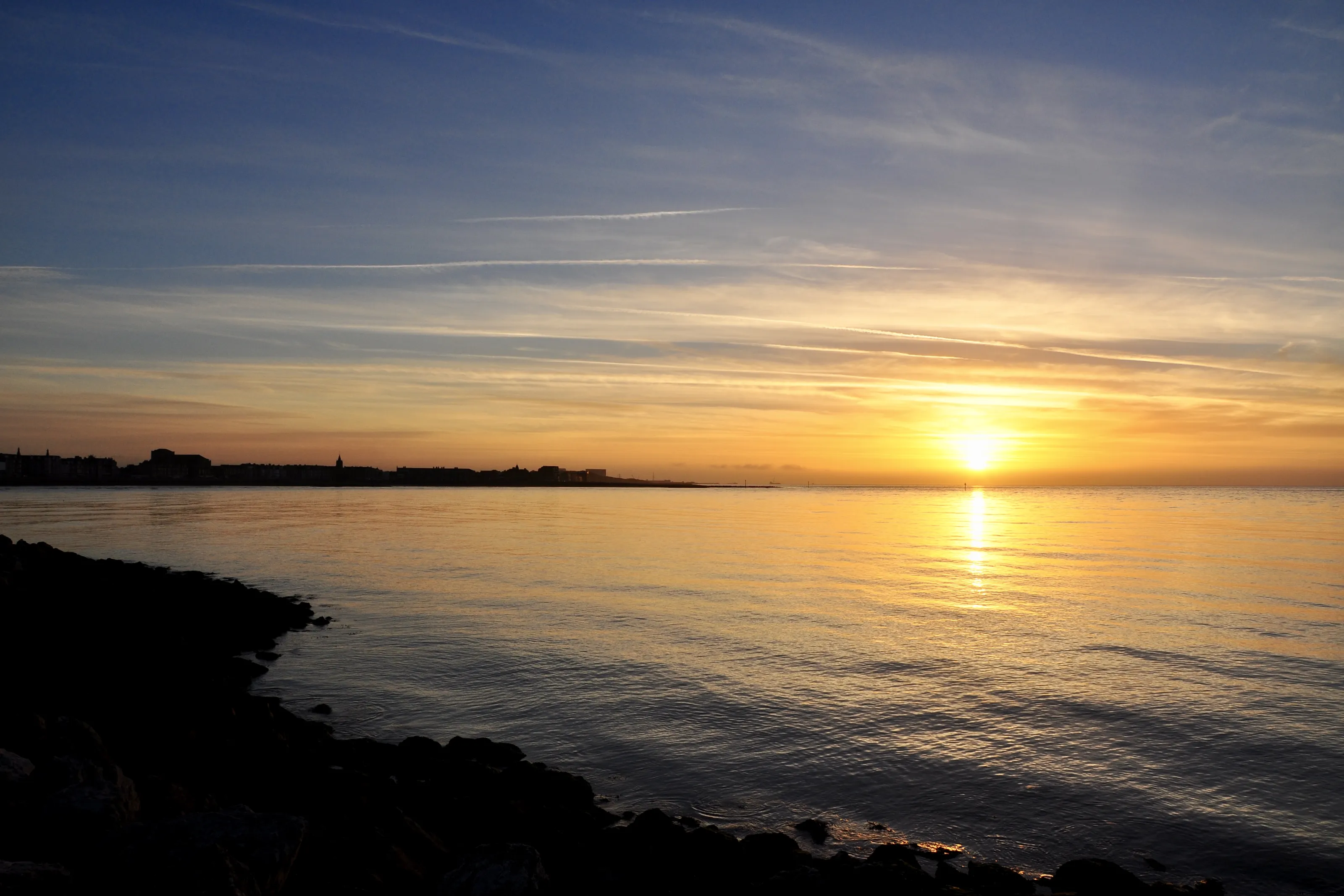 Sun meets horizon