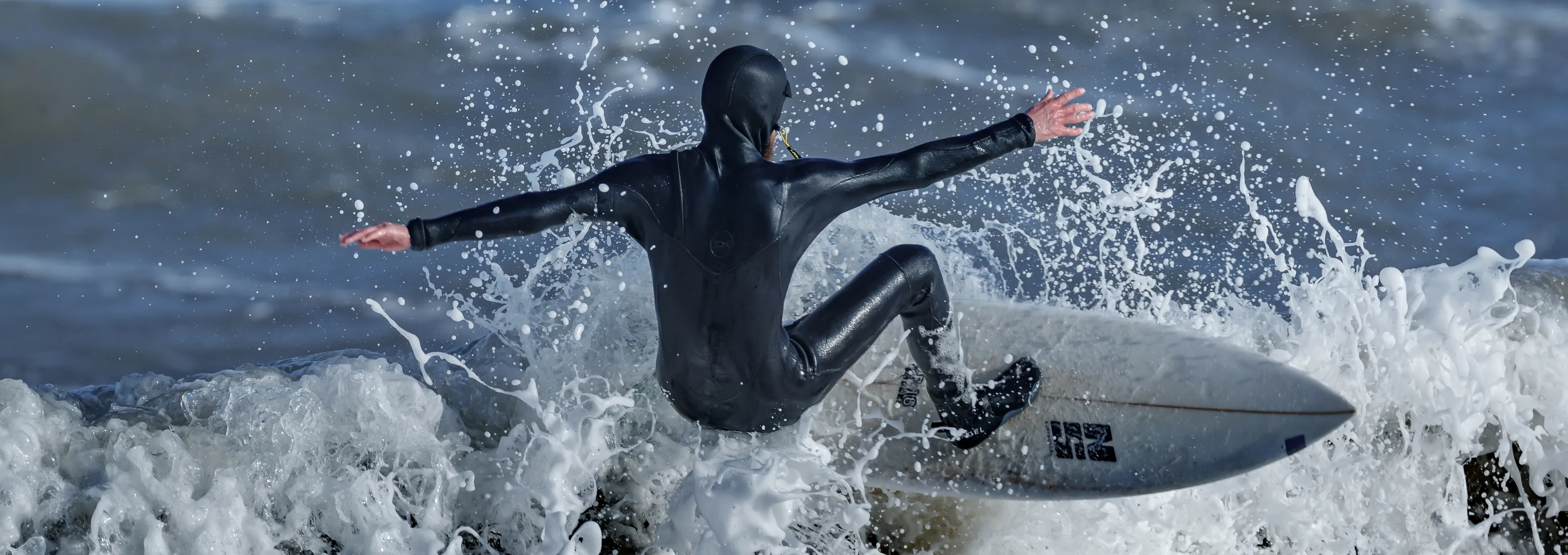 Surfers In Action