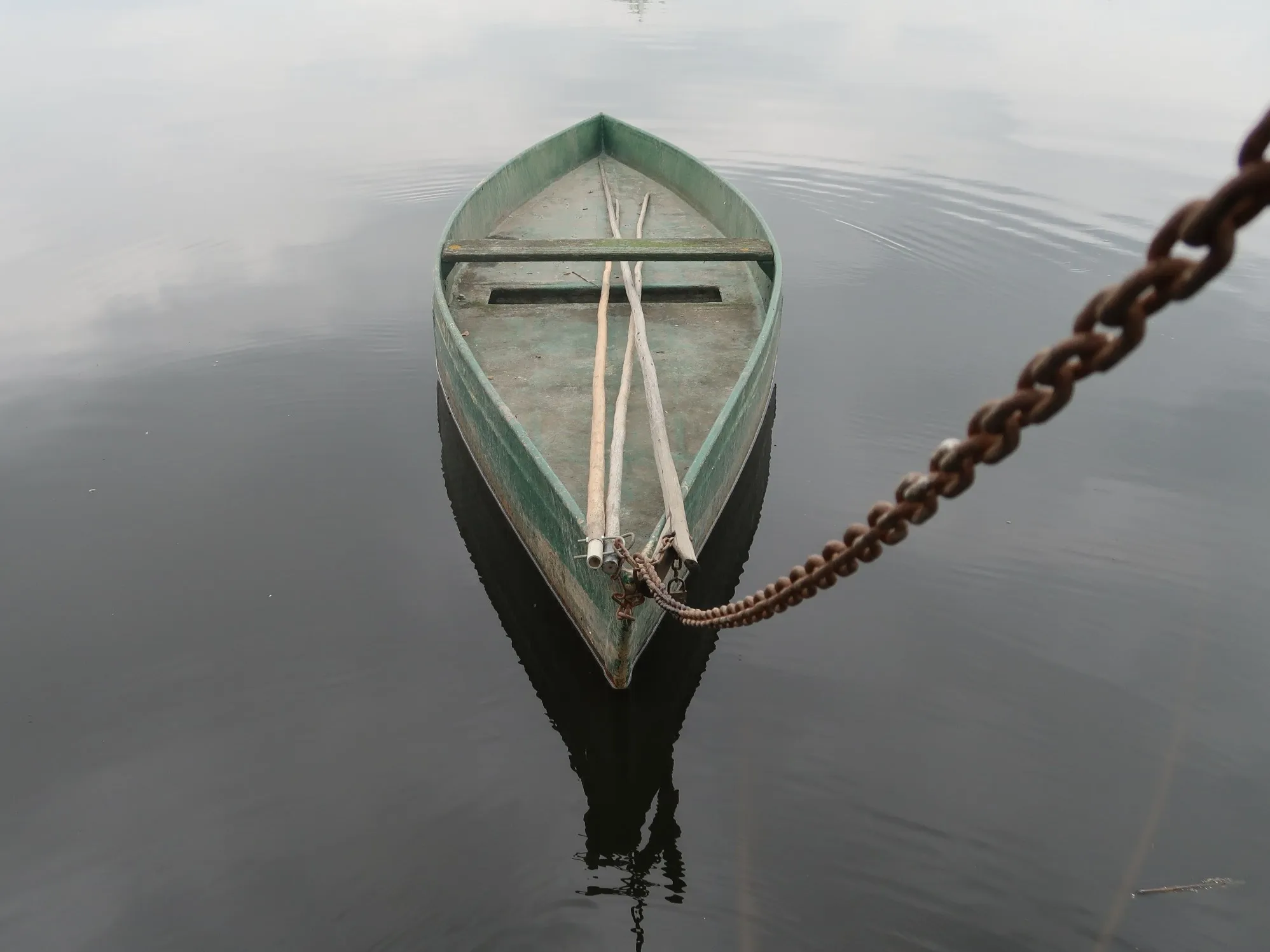 Single Wooden Boat on Water