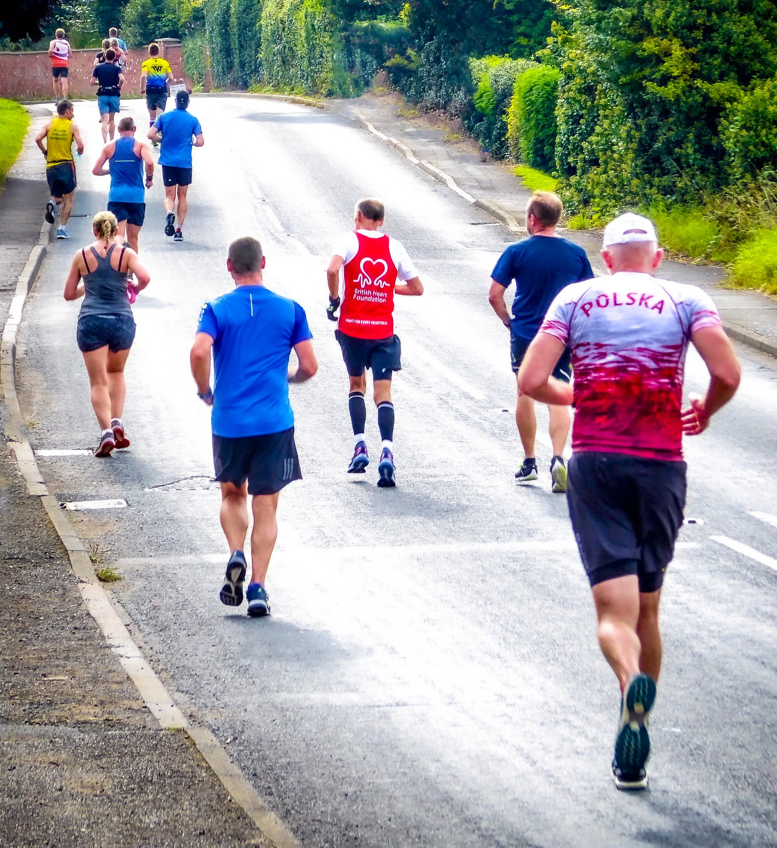 Groups of People Running (at least four people)