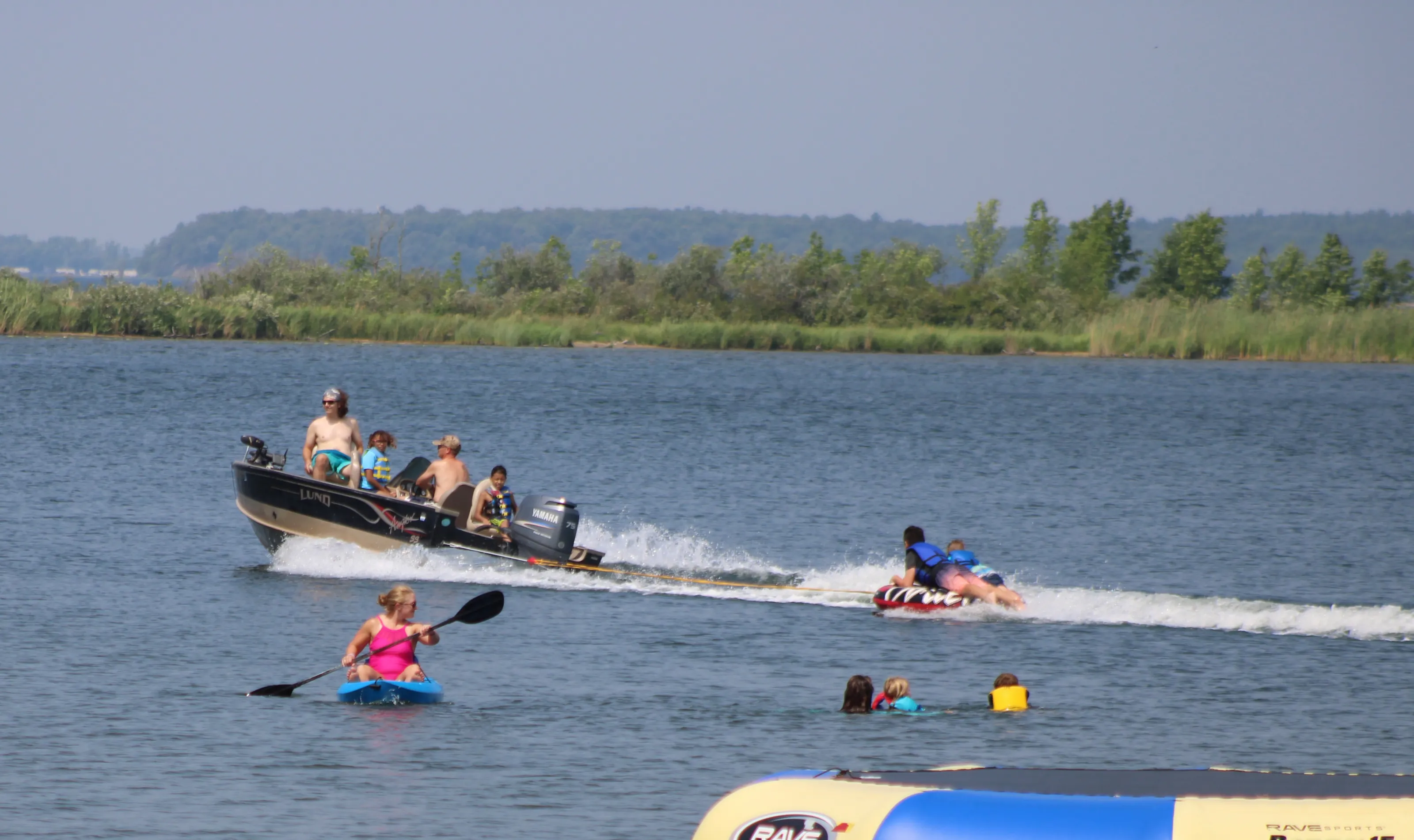 People Enjoying Lakes