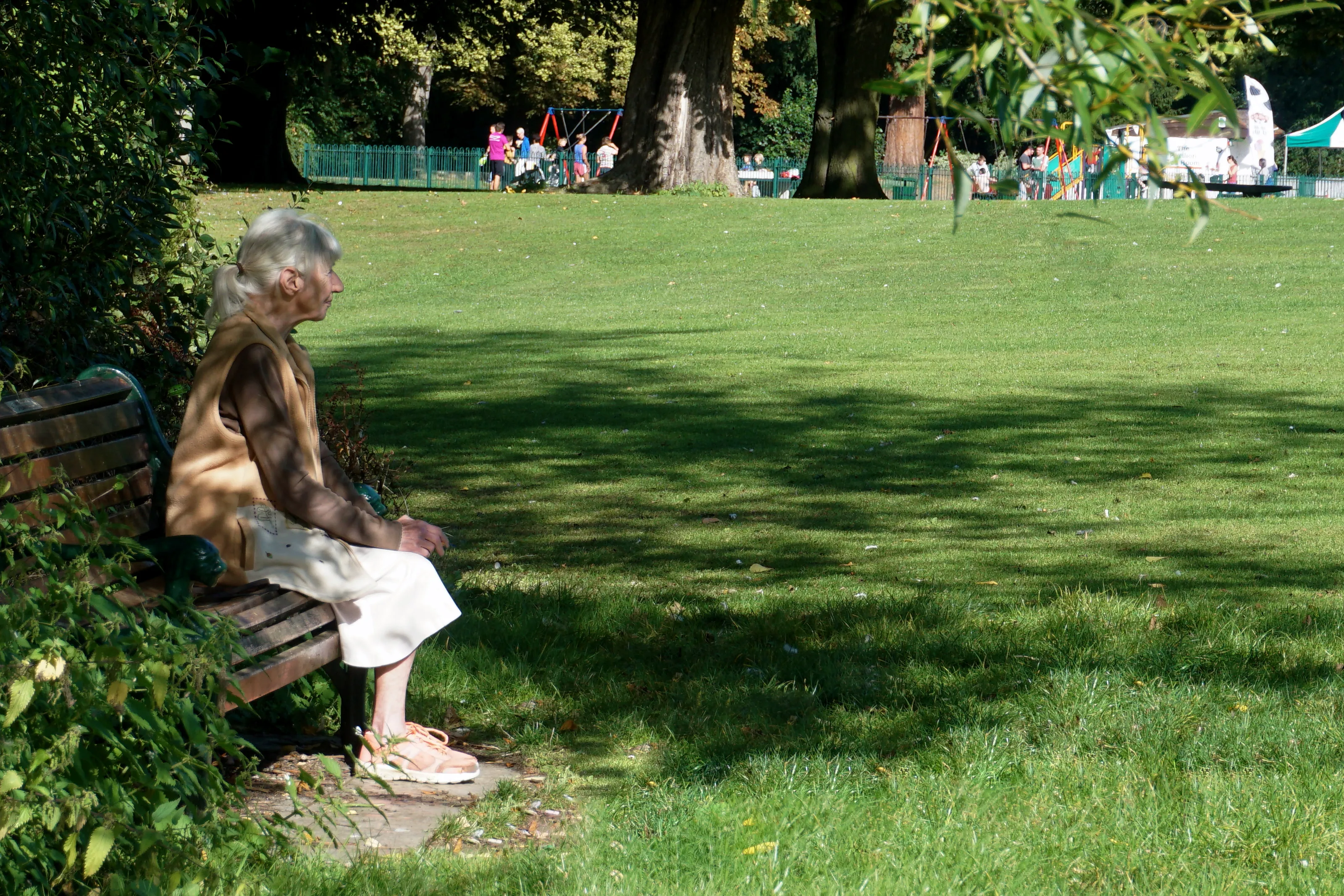 One Person Sitting Alone Outside (no animals)