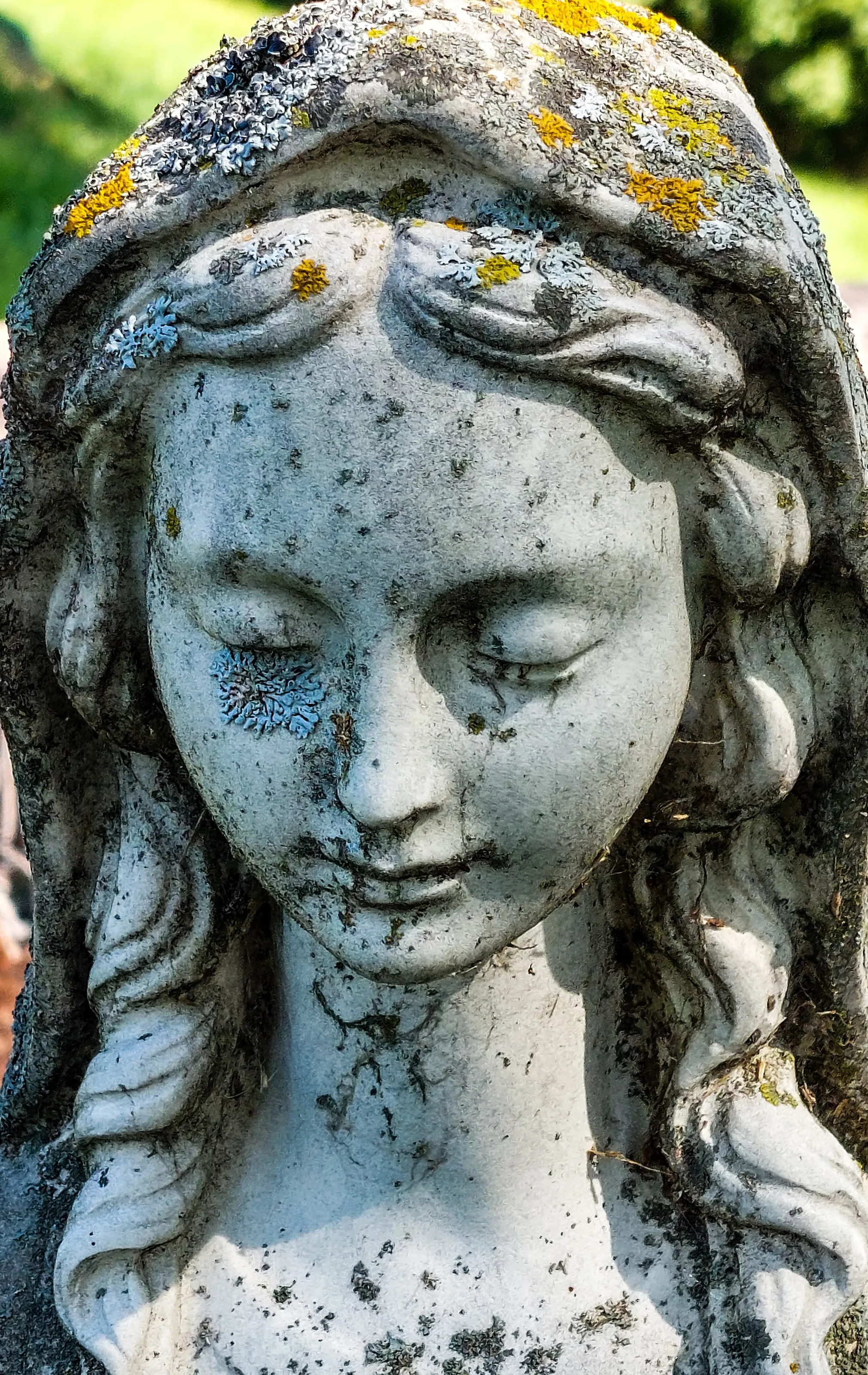 Faces of Cemetery Statues