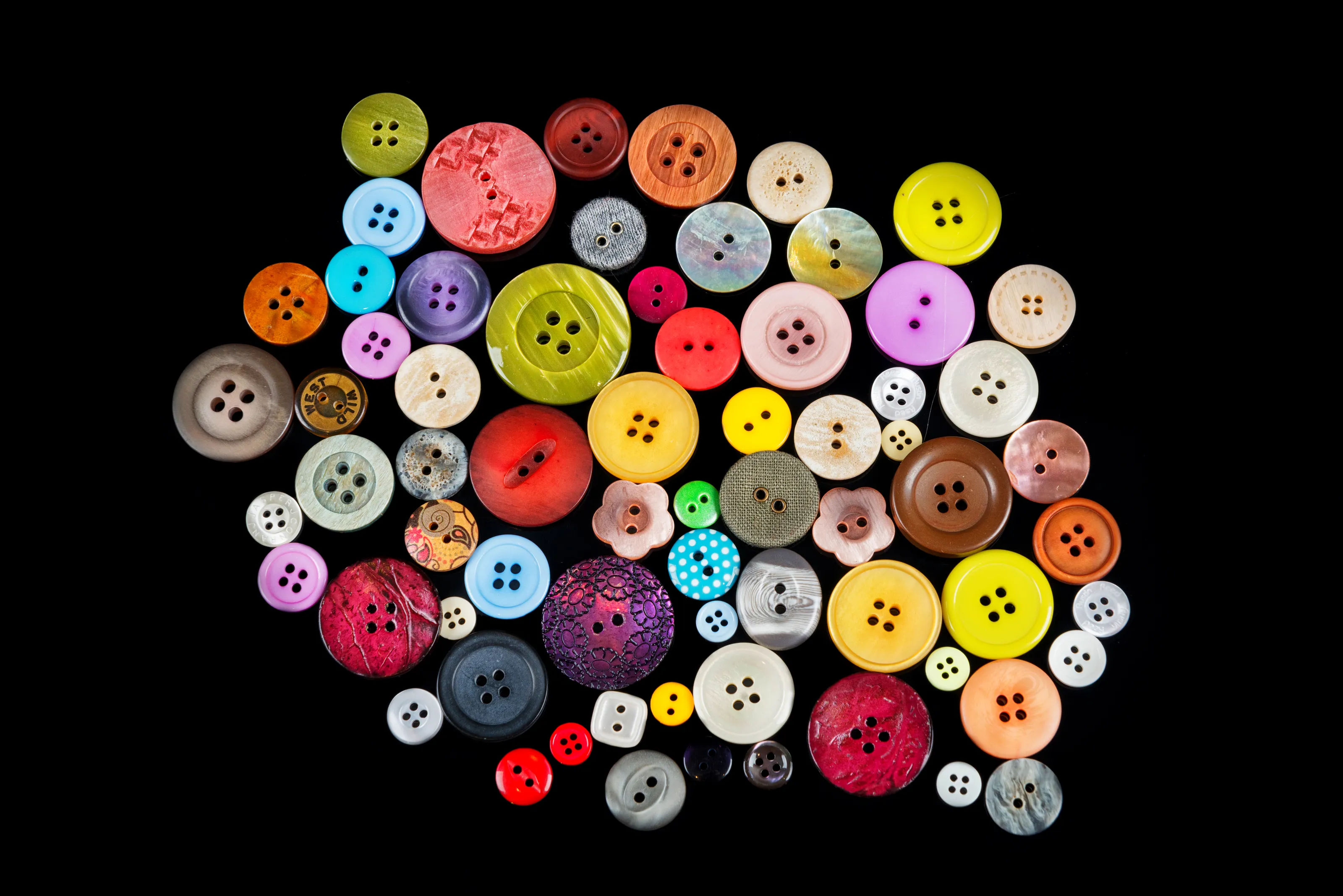 Buttons (for fastening/decorating fabrics)