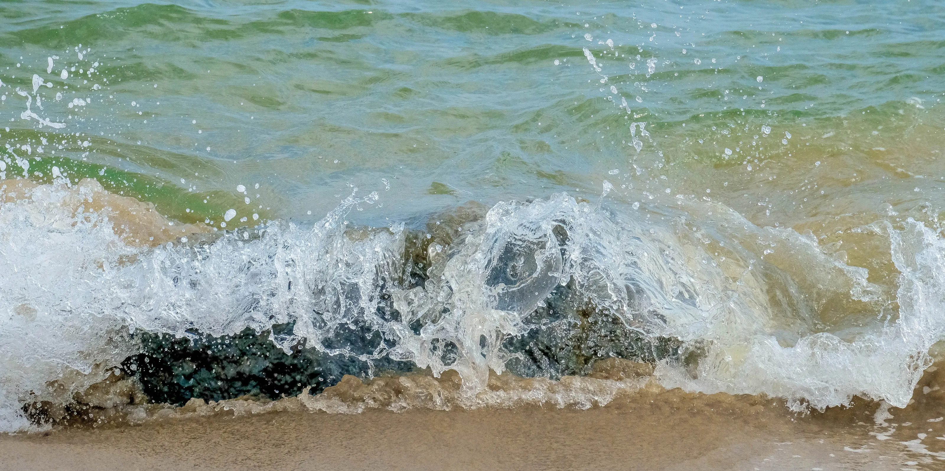 Waves Crashing Over Rocks