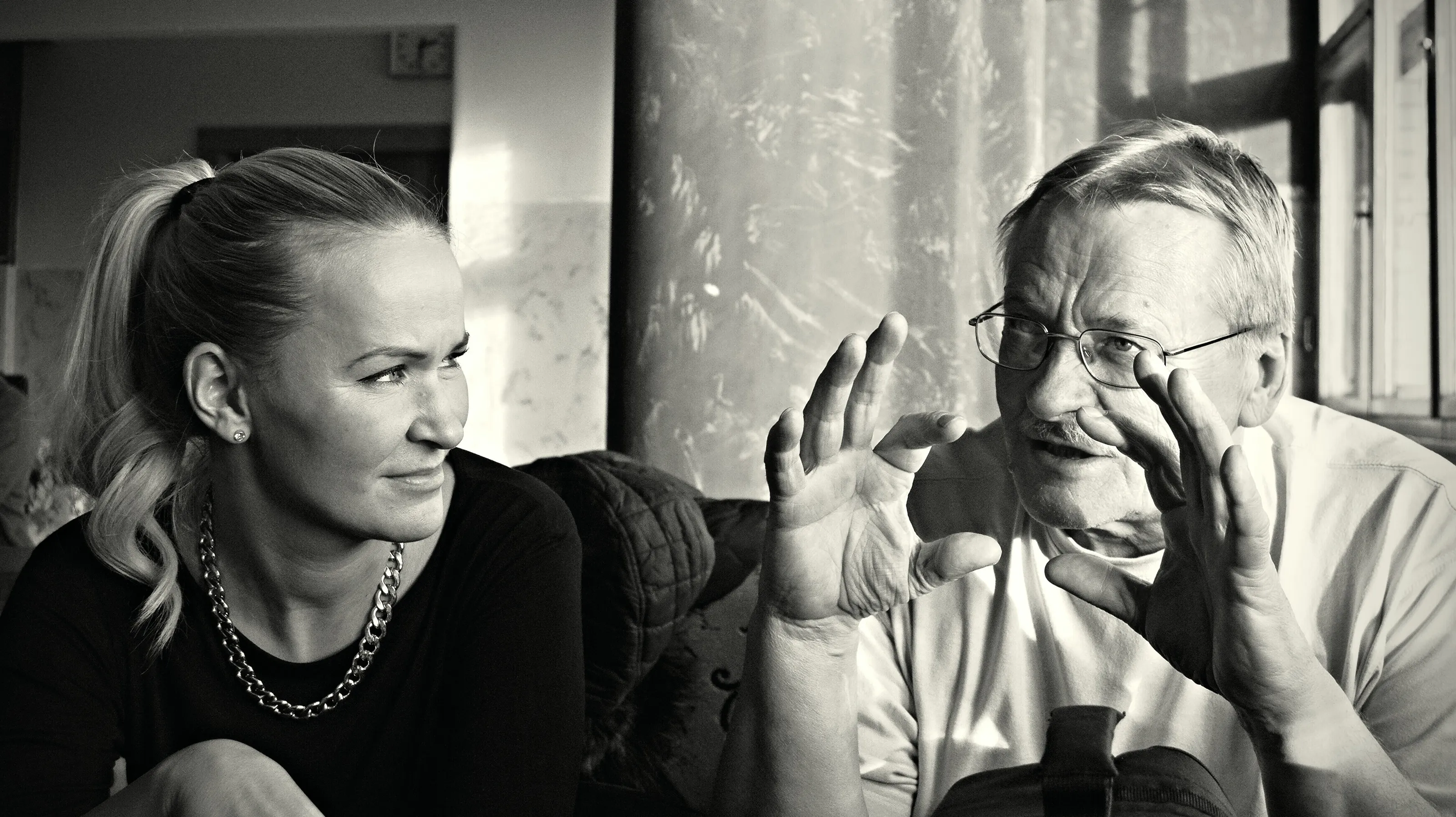 Two People in Conversation
