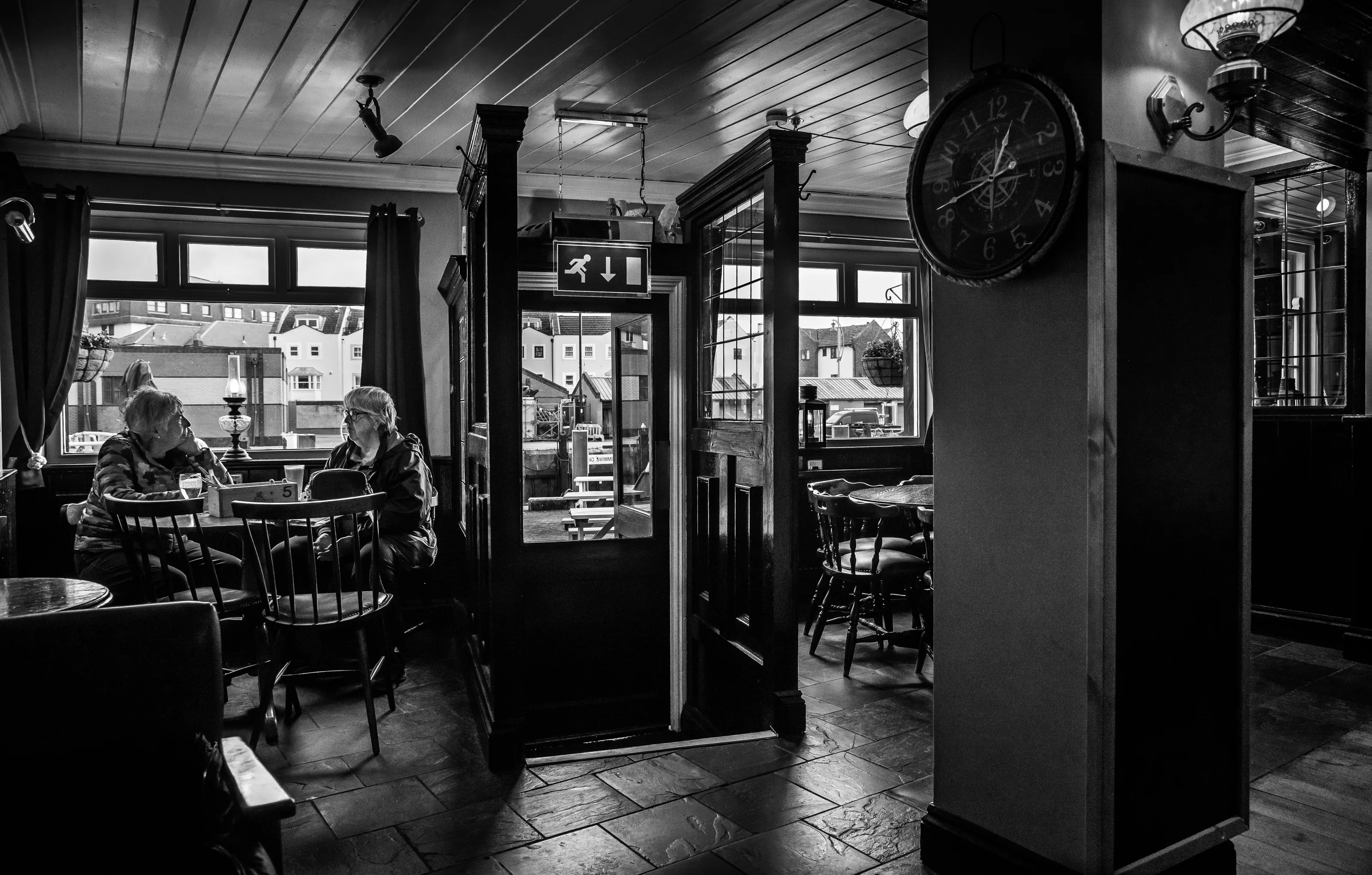 Two or More People Inside a Pub or Bar