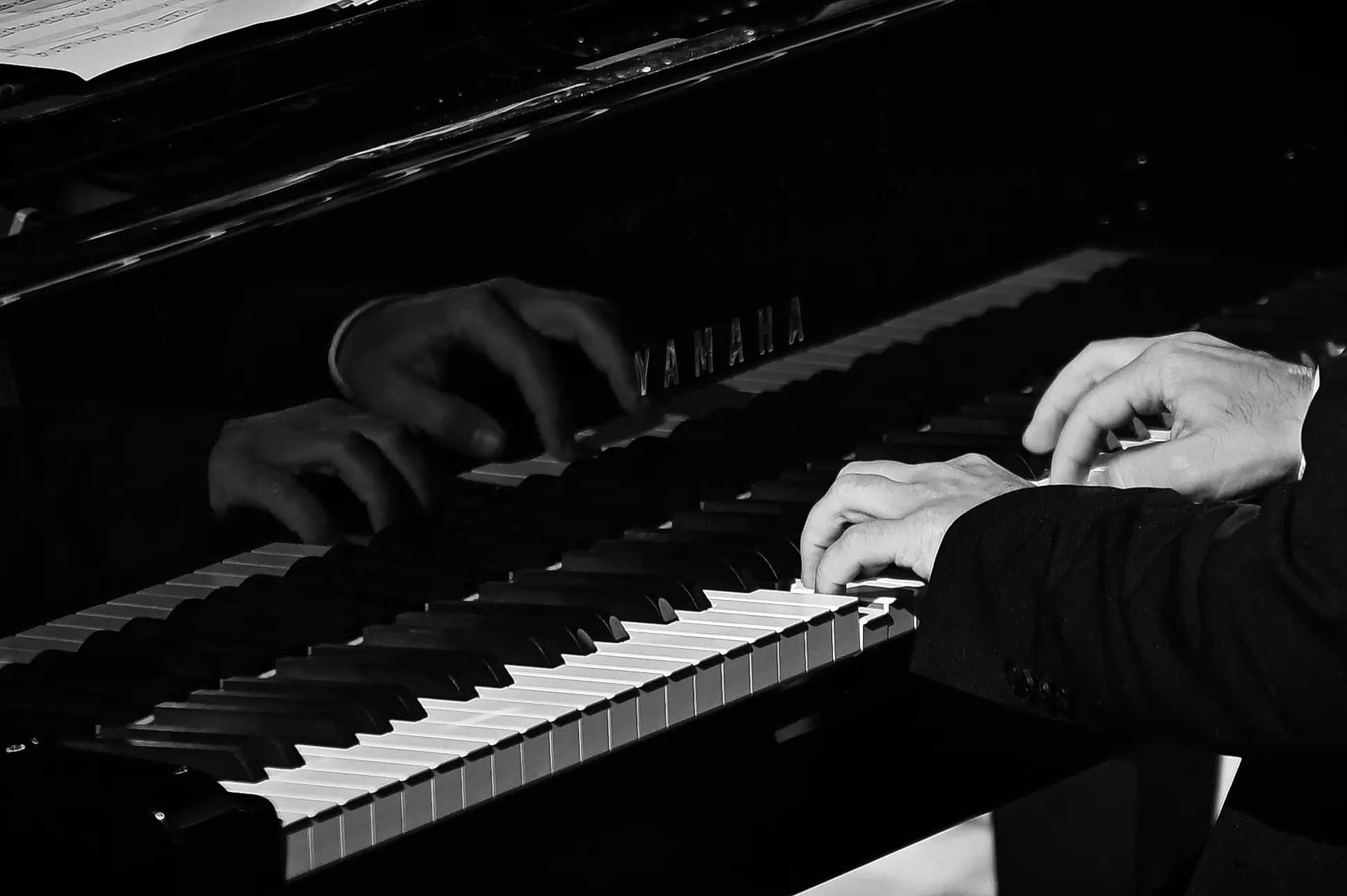 People Playing the Piano