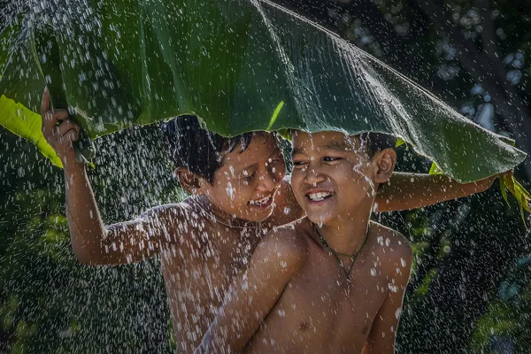 Children Playing In or With Water