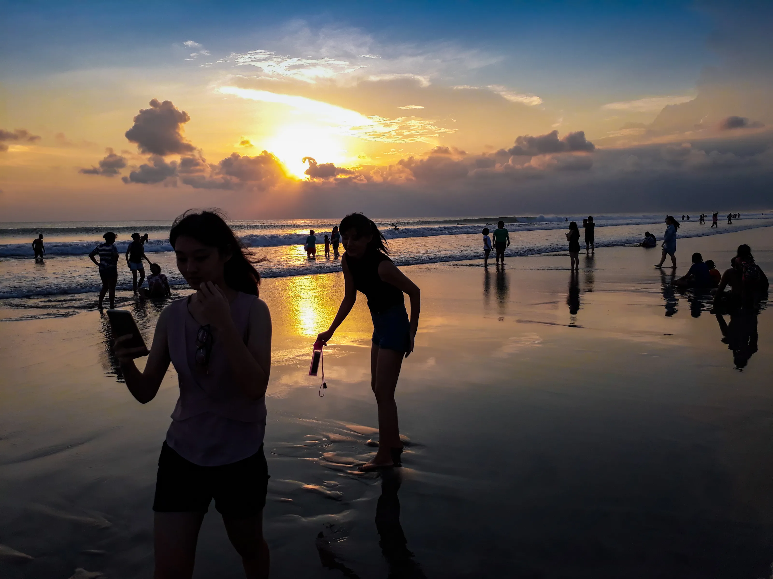 Silhouettes of People on the Beach