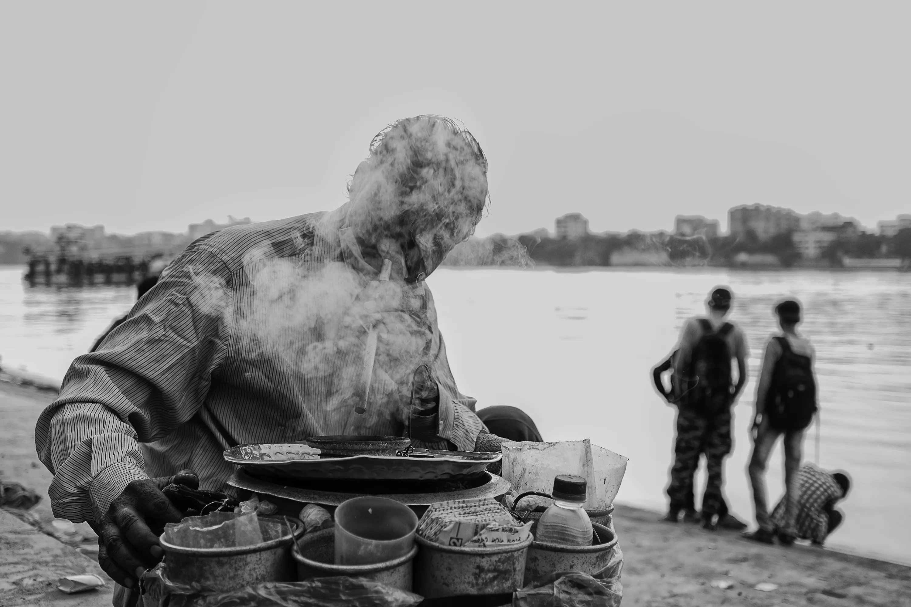 People and Smoke in Black and White