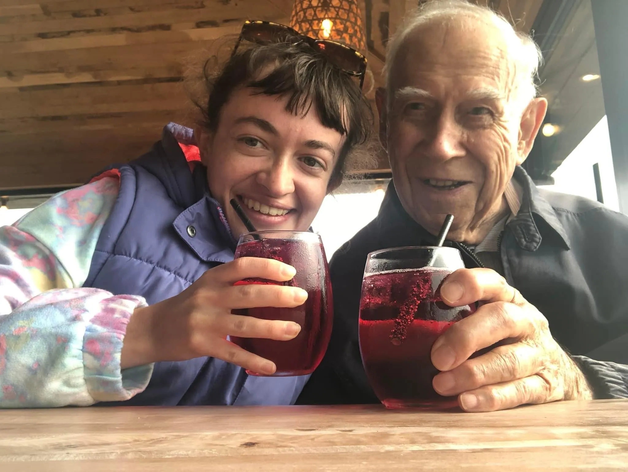 People Holding Drinking Glasses