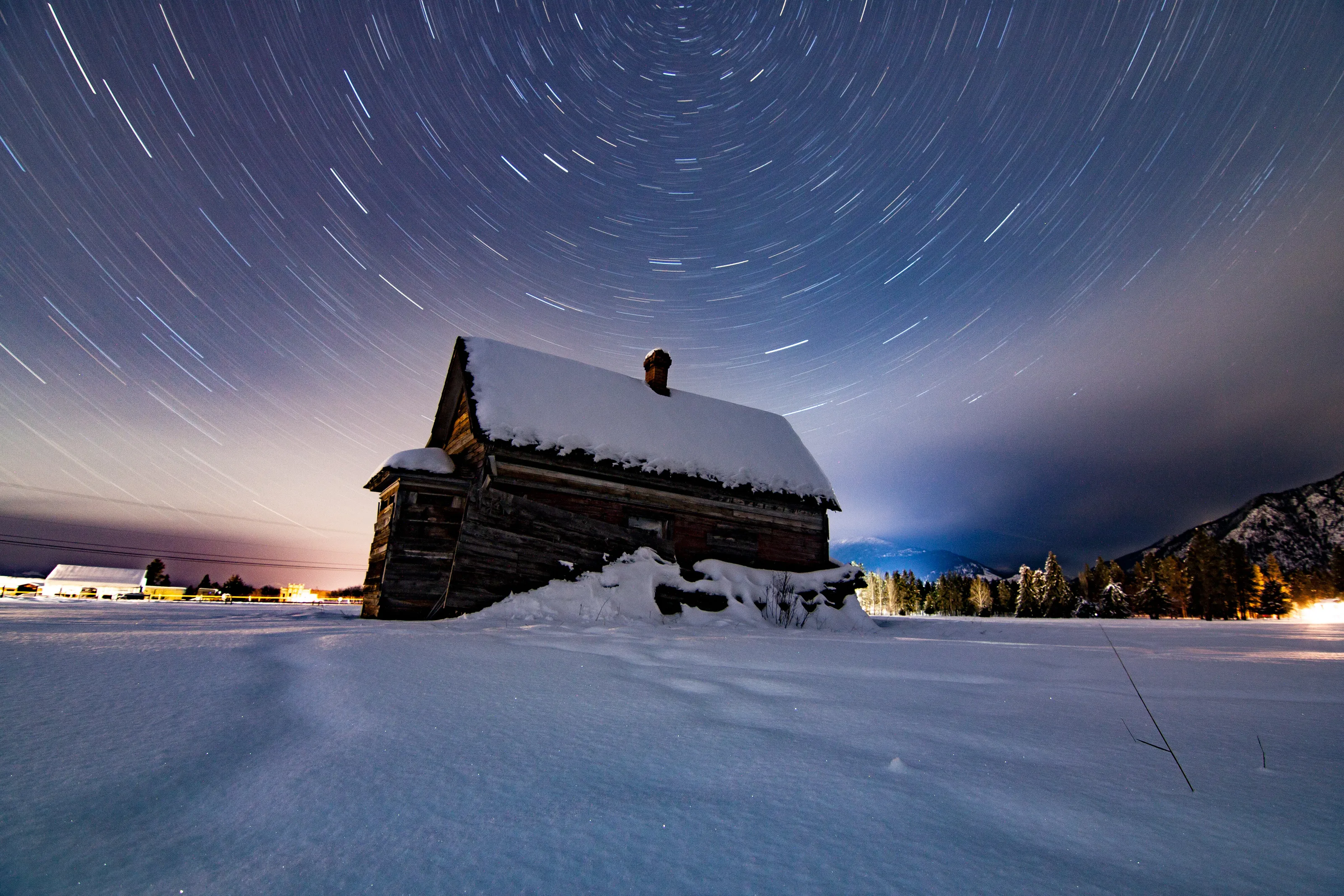 snowy barn star trails