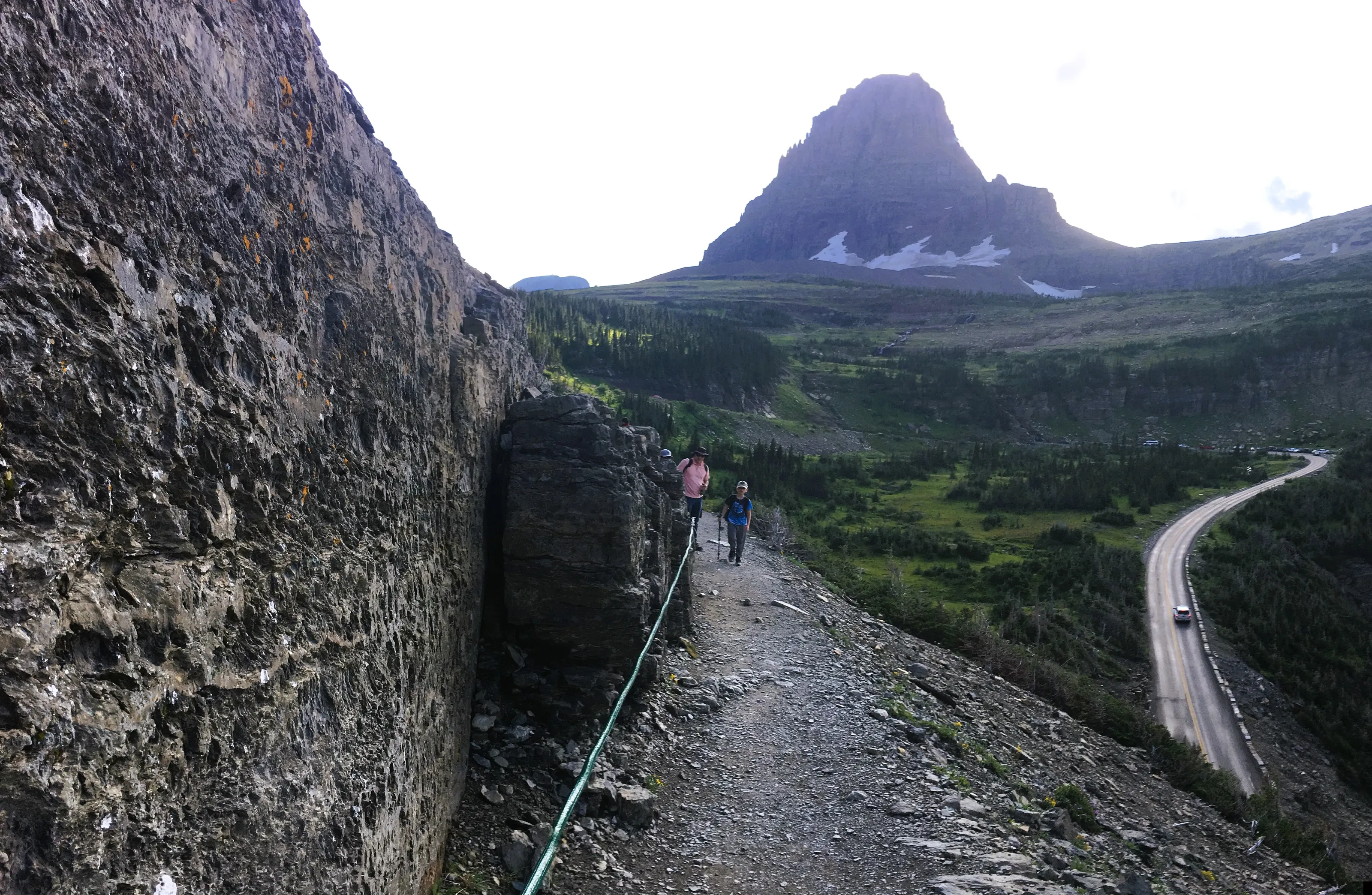People Walking as if on the Edge of the World