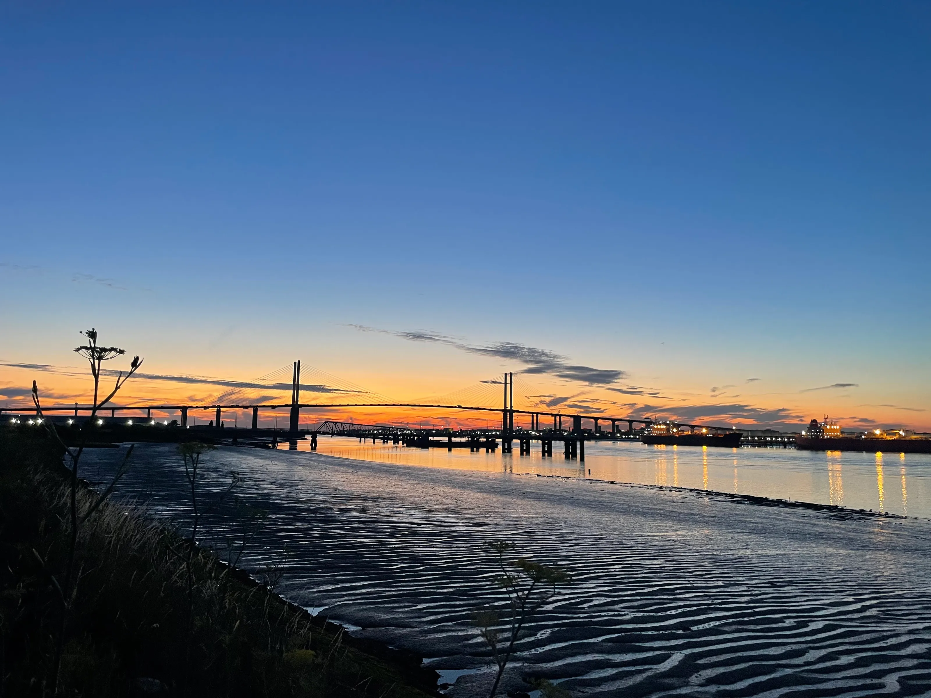Queen Elizabeth II Bridge and Banks of Thames at Sunset