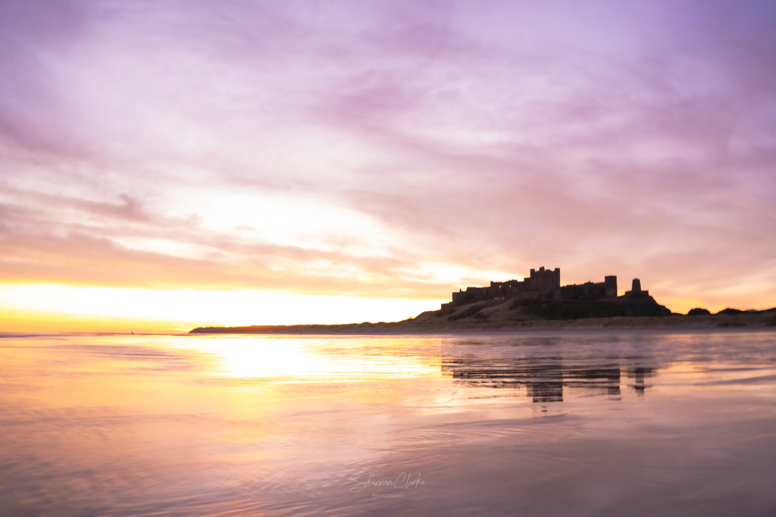 Dawn surrounds the castle