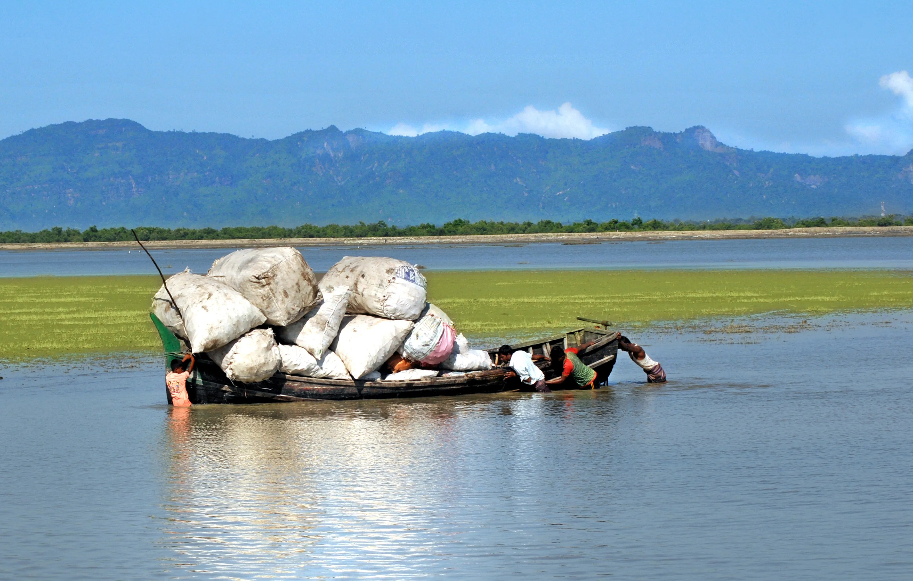 River crossing loaded with goods