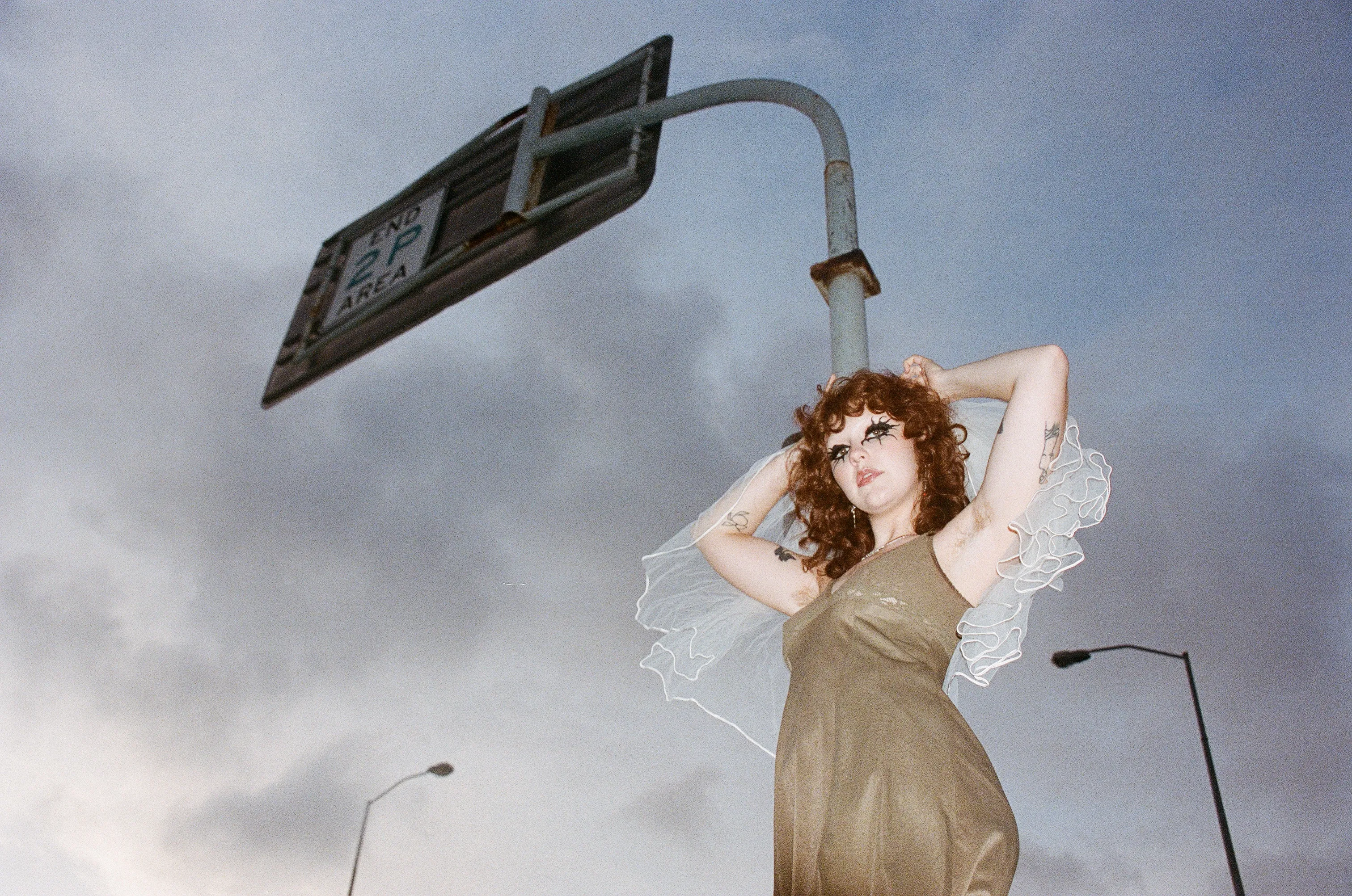 lina by the sign