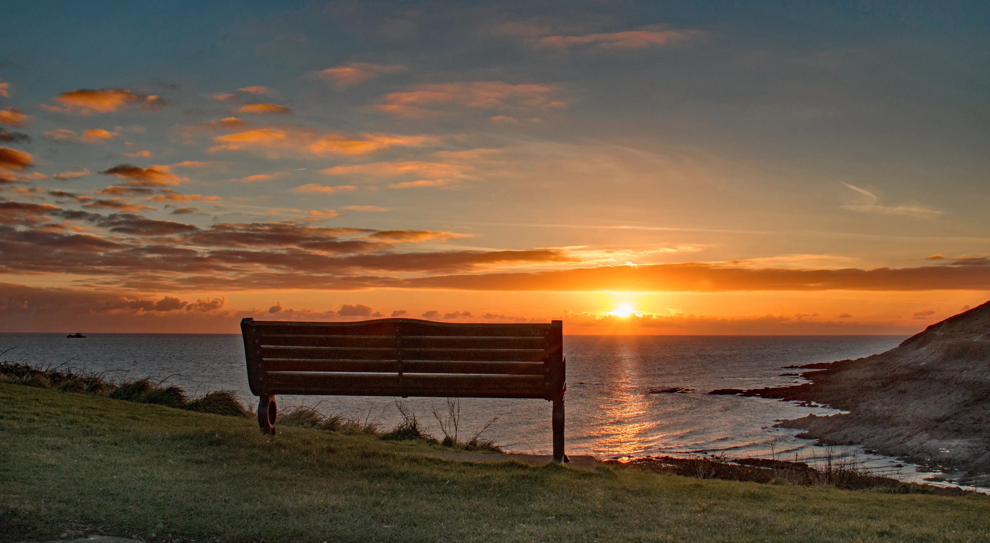Bench overlooking  Limeslade Bay