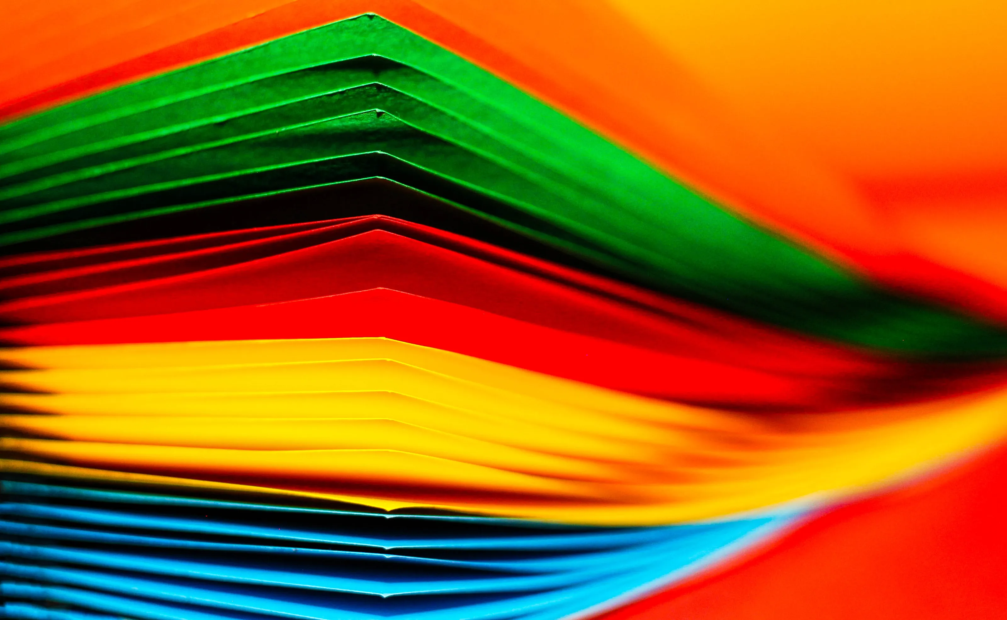 multi colour paper fading into the blur