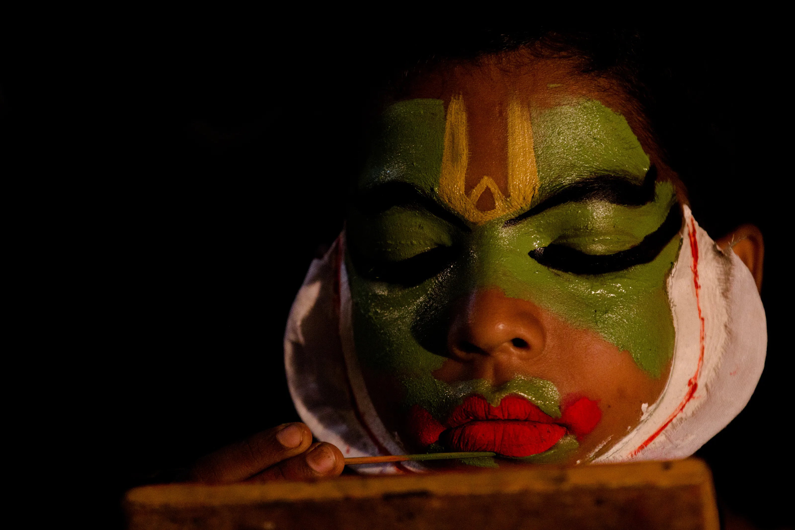 A young artist preparing for the ancient artform of India, Krishnanattam