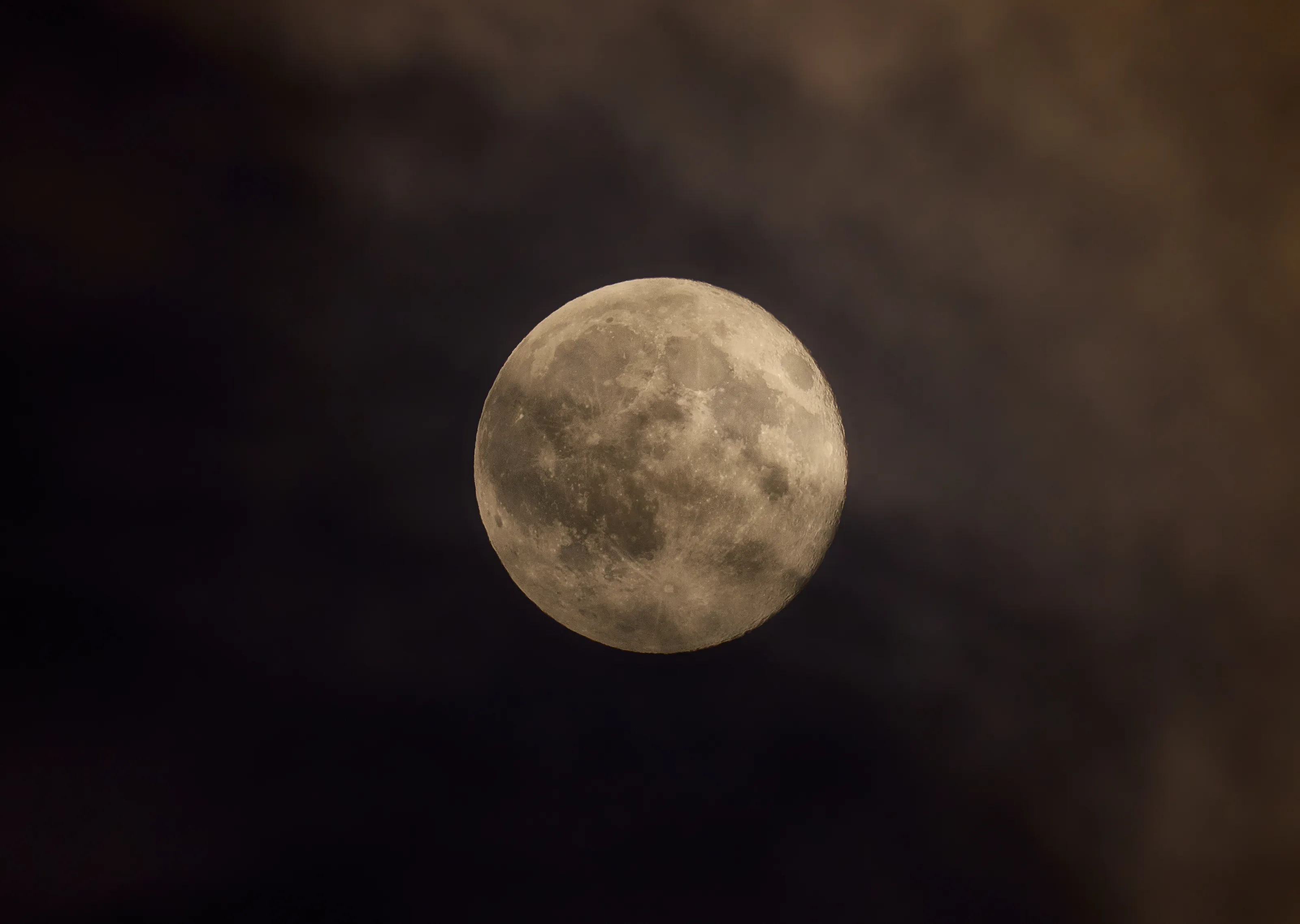 Moon Behind Clouds