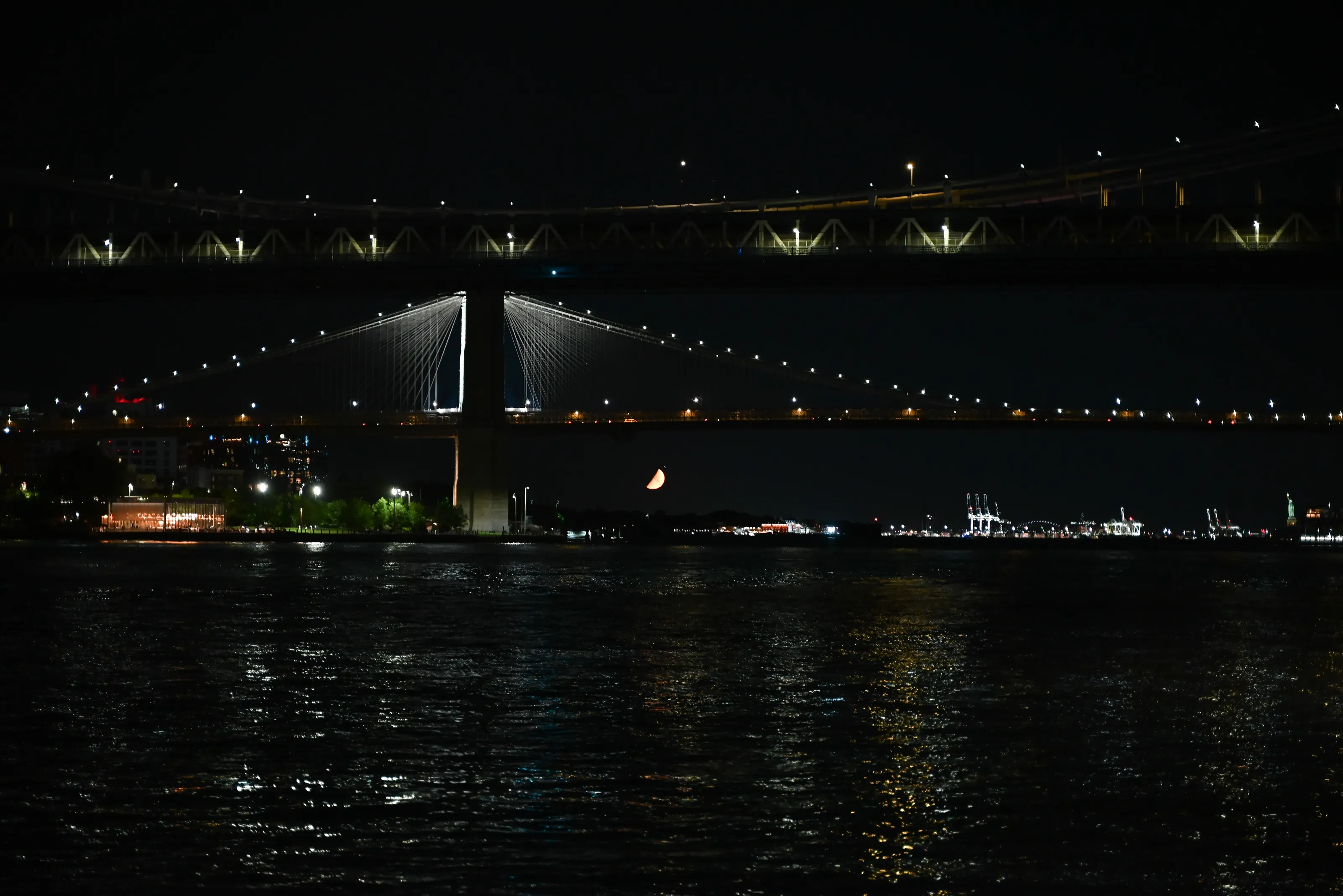 Moon set Manhattan and Brooklyn Bridges
