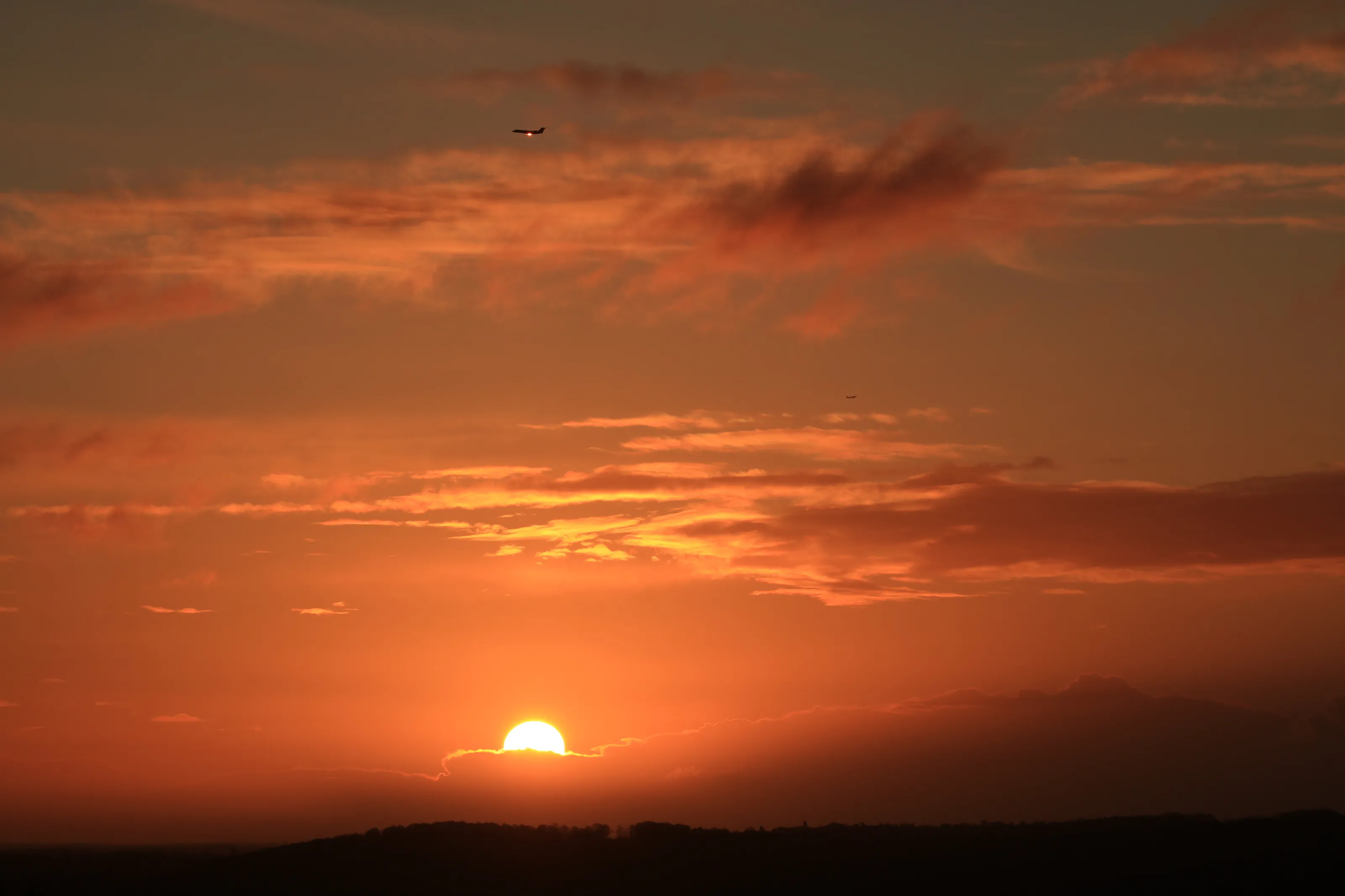 Winter sunrise, planes overhead